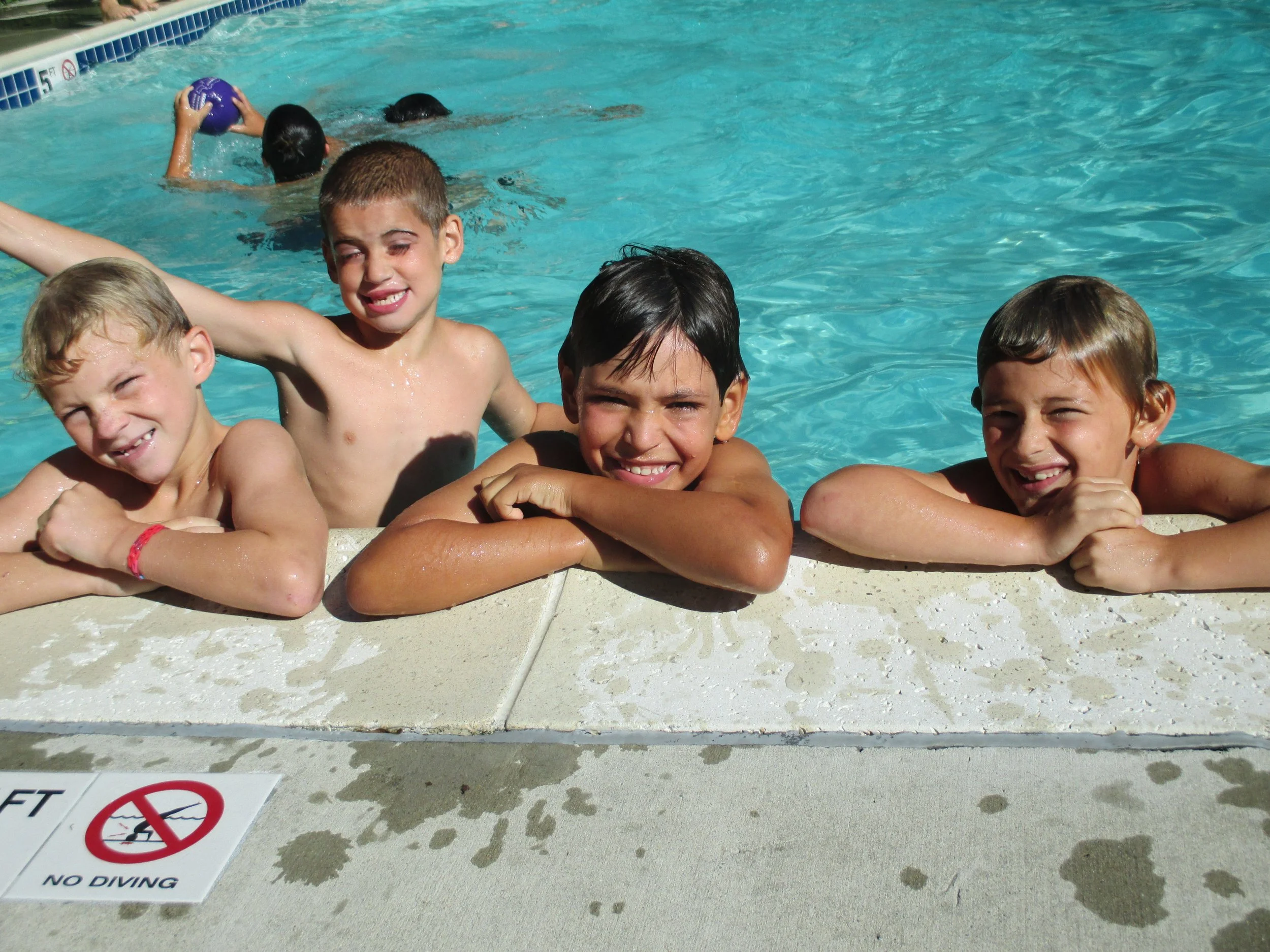 boys in pool.JPG