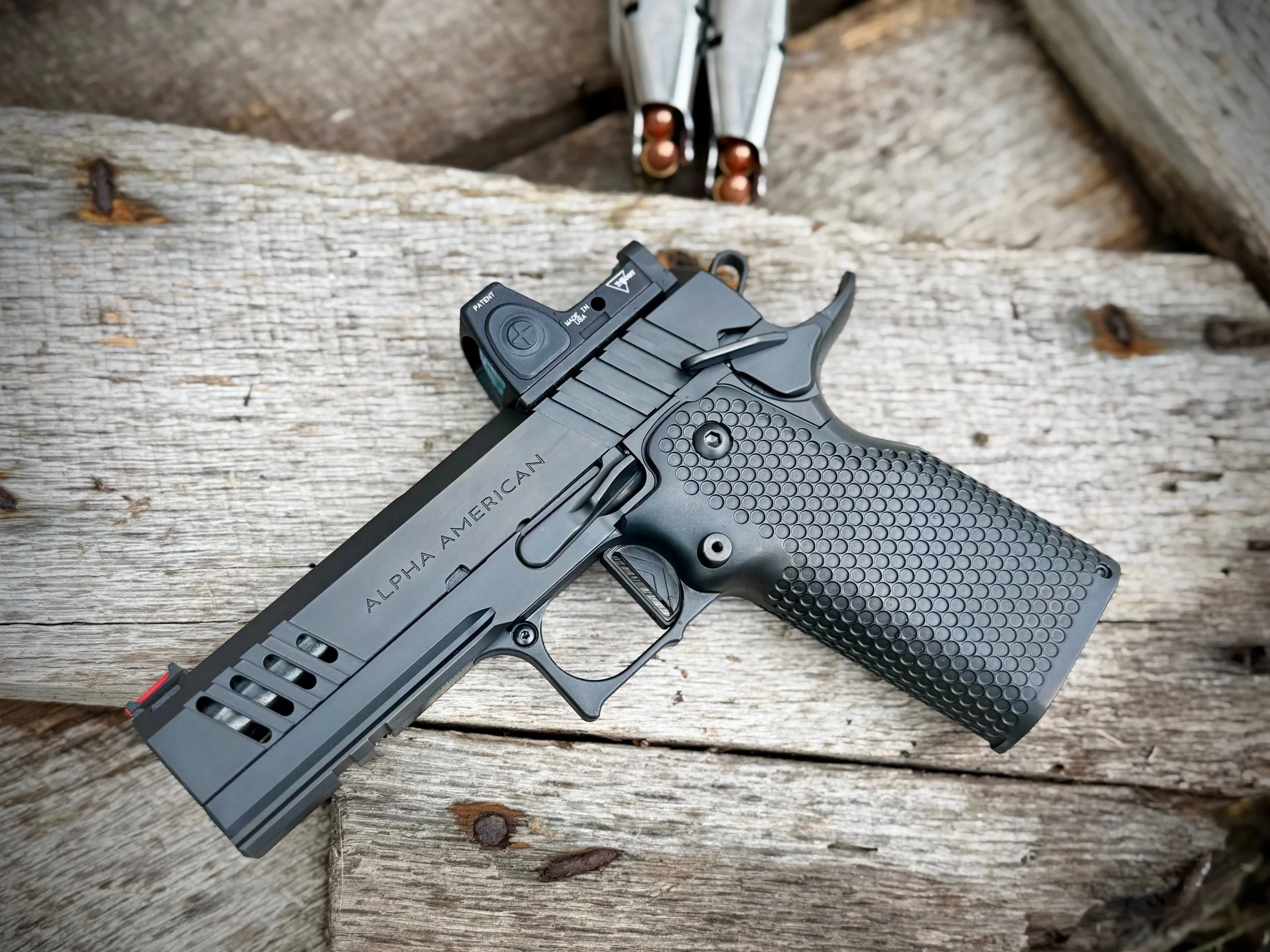 Alpha American Vanguard with Window Serrations and Single Top Porting finished in DLC