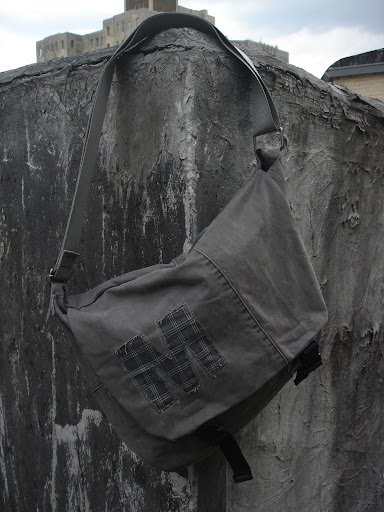 grey messenger bag alone.jpg
