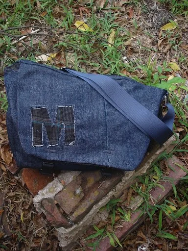 dark blue denim messenger bag alone.jpg