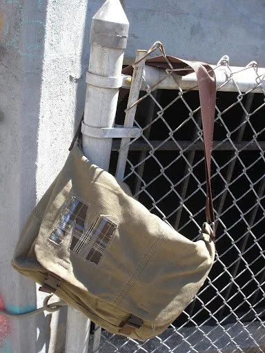 green messenger bag alone.jpg