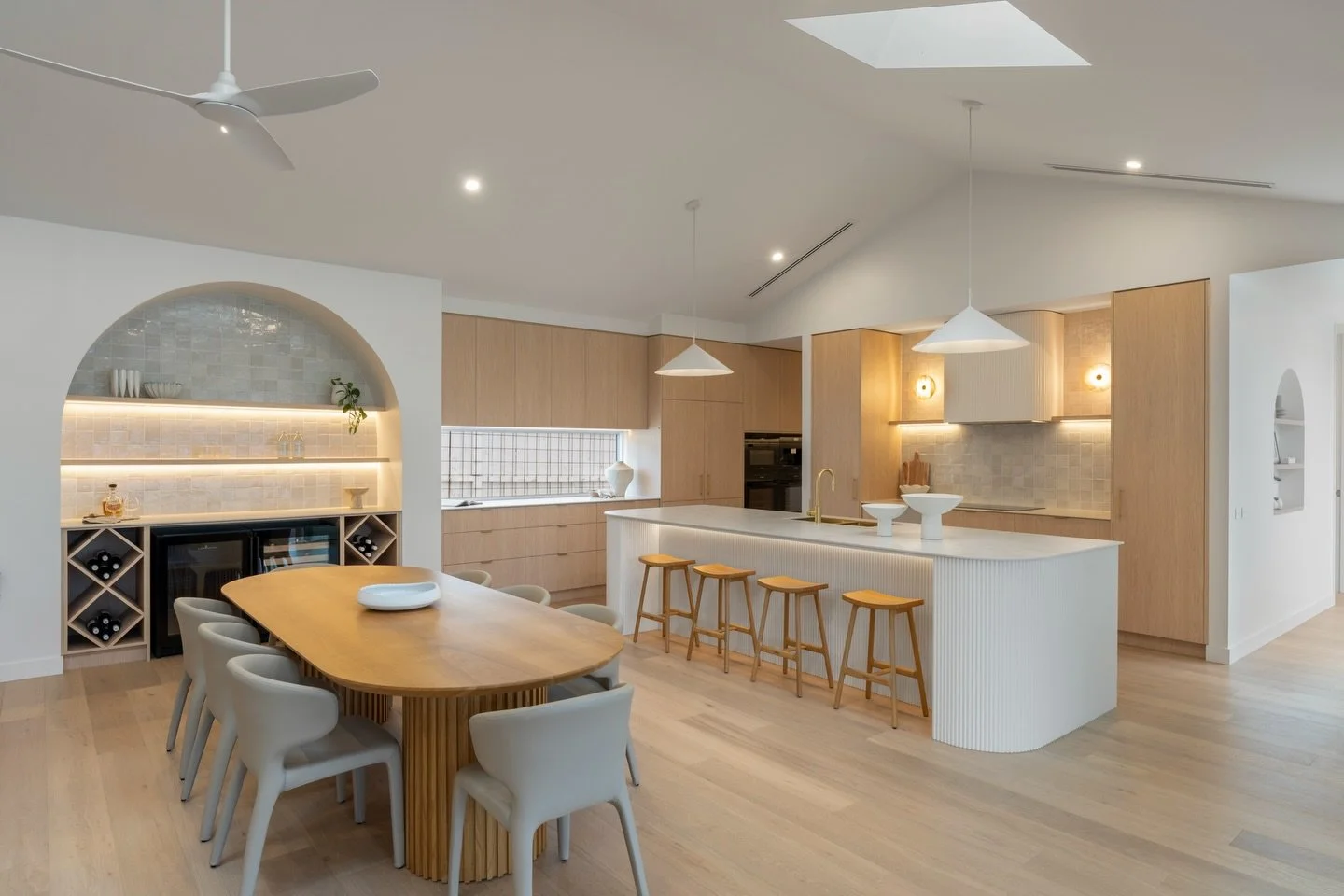 The kitchen at our Haven project is an absolute showstopper 💫

Warm, inviting and designed with functionality at its core, the space is anchored by a stunning pitched ceiling that adds both scale and character. Porcelain benchtops are paired with fl