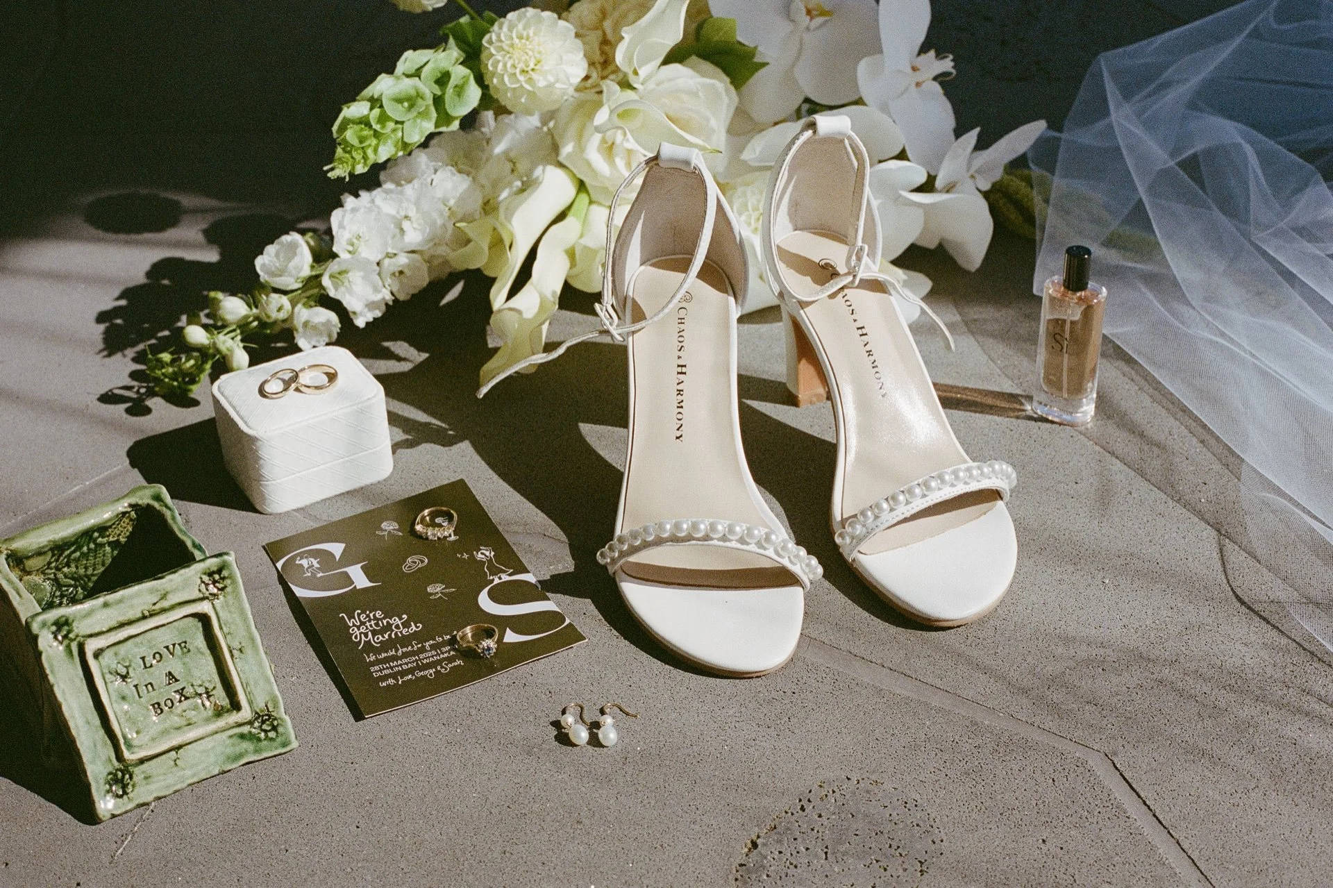 A 35mm film photo of bridal details at a wanaka wedding at dublin bay