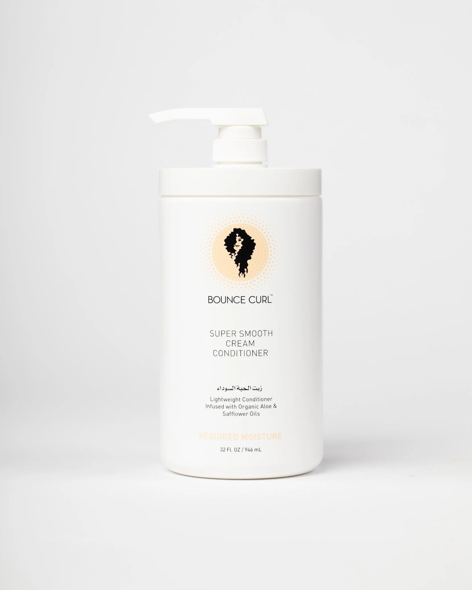 White bottle of Bounce Curl Super Smooth Cream Conditioner with a pump dispenser, label featuring a black silhouette of a woman with curly hair, and product details in English and Arabic.
