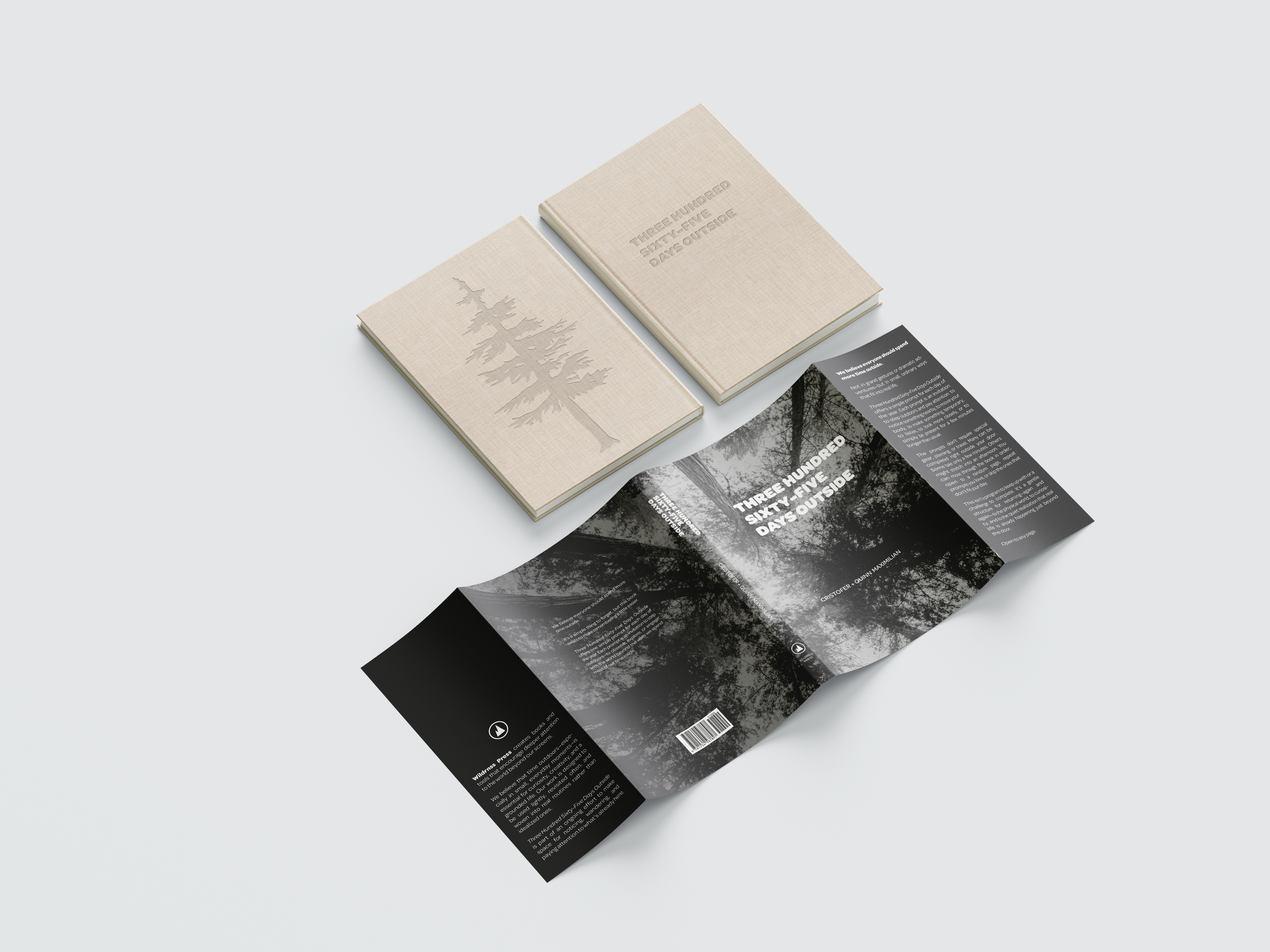 Open trip brochure with black and white forest image on first page and two beige notebooks on top, one with a tree embossed design and the other with the text "THREE HUNDRED SIXTY - FIVE DAYS OUTSIDE".