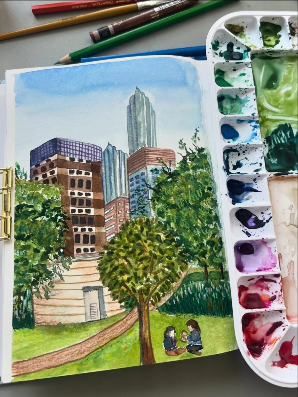 Watercolor Sketchbook work from an Inspo photo of a corner of the park near our apartment. We took an evening stroll there and it felt strangely peaceful considering what was going on. We love our life here. God bless #uae . Please end the war soon!