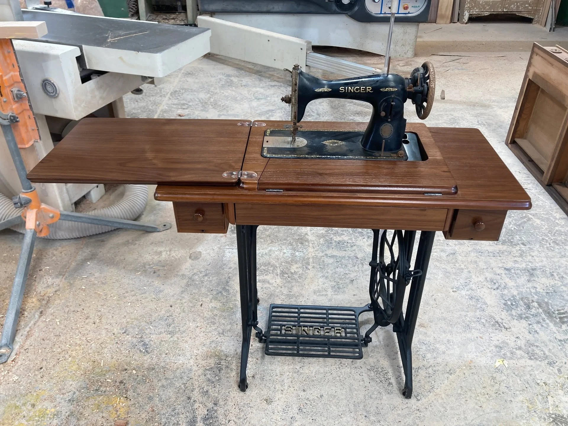 This beautiful vintage Singer Sewing machine had definitely seen better days.
But underneath all that wear was a timeless piece of craftsmanship just waiting for a second chance with a
full restoration of the Walnut Case &amp; Cast Iron underframe.
#