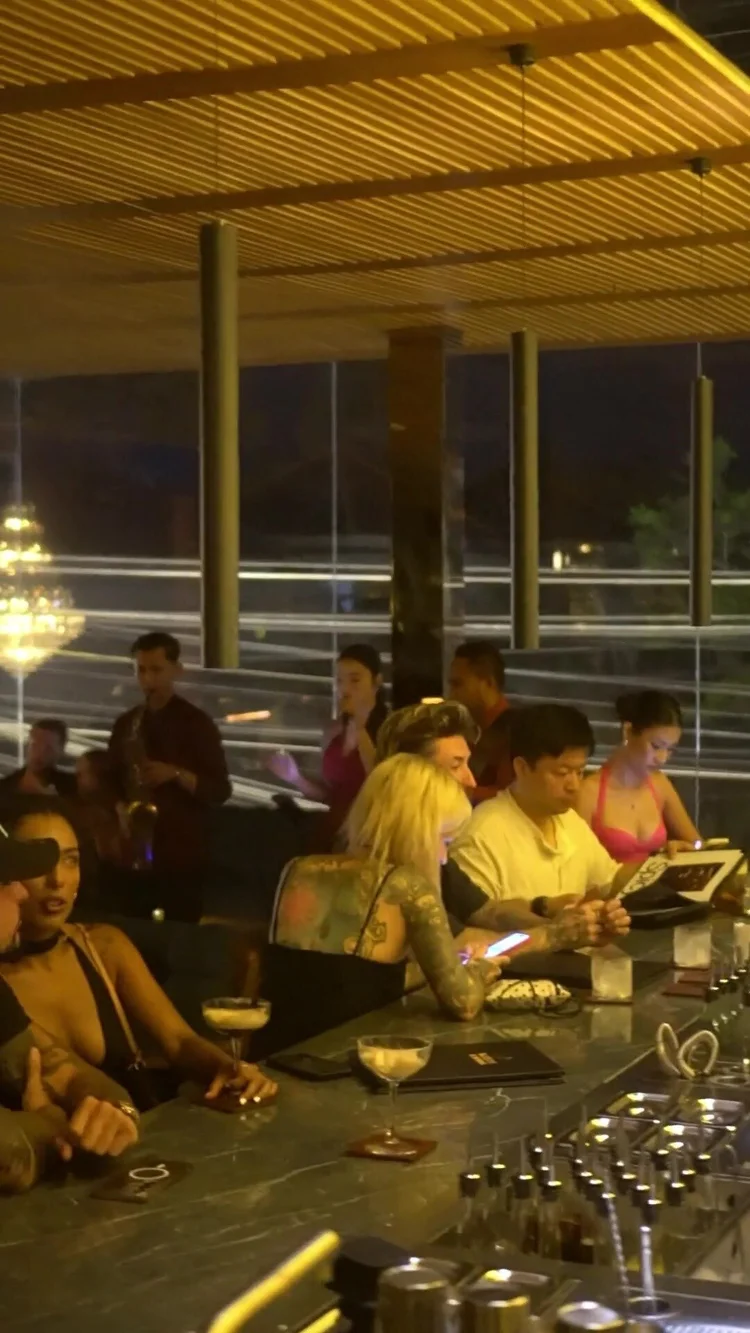 Guests at the marble bar on a weekend night