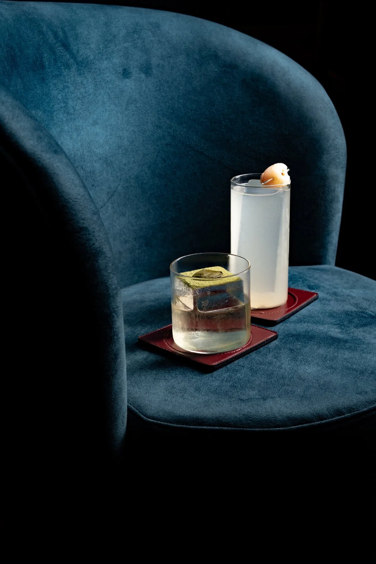 Two cocktails on a lounge chair