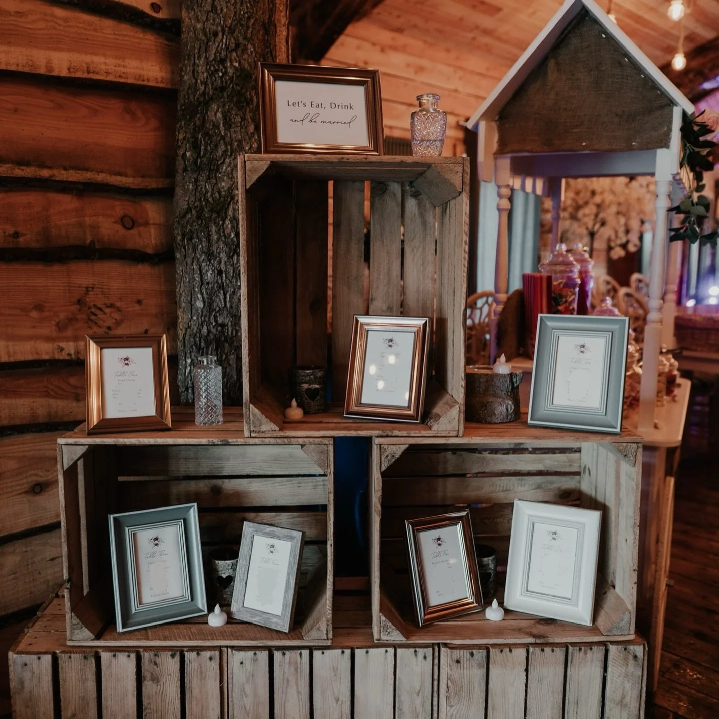 'Let&rsquo;s eat, drink and be married&rsquo; &mdash; if that doesn&rsquo;t sum up the vibe, I don&rsquo;t know what does! 🧡 Rustic wooden frames, cosy tones, and burgundy blooms, J&amp;M nailed the warm, welcoming feeling for their big day ✨

Cosy 