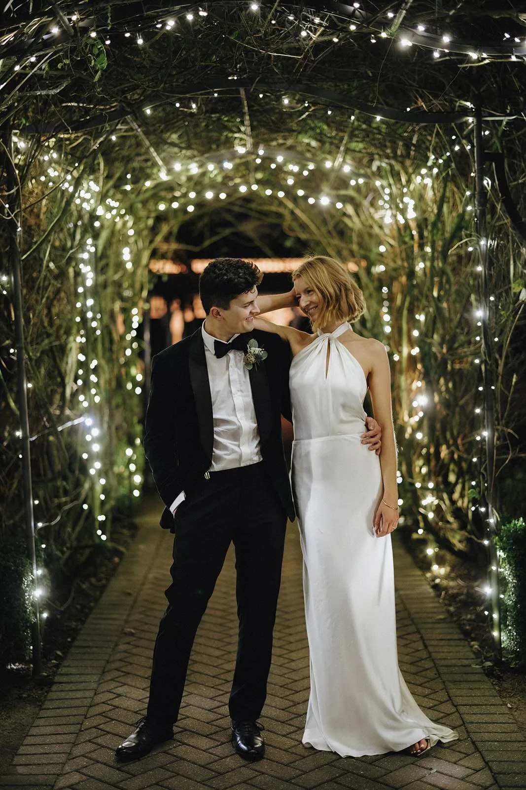 twilight wedding venue kent exterior illuminated gardens with couples