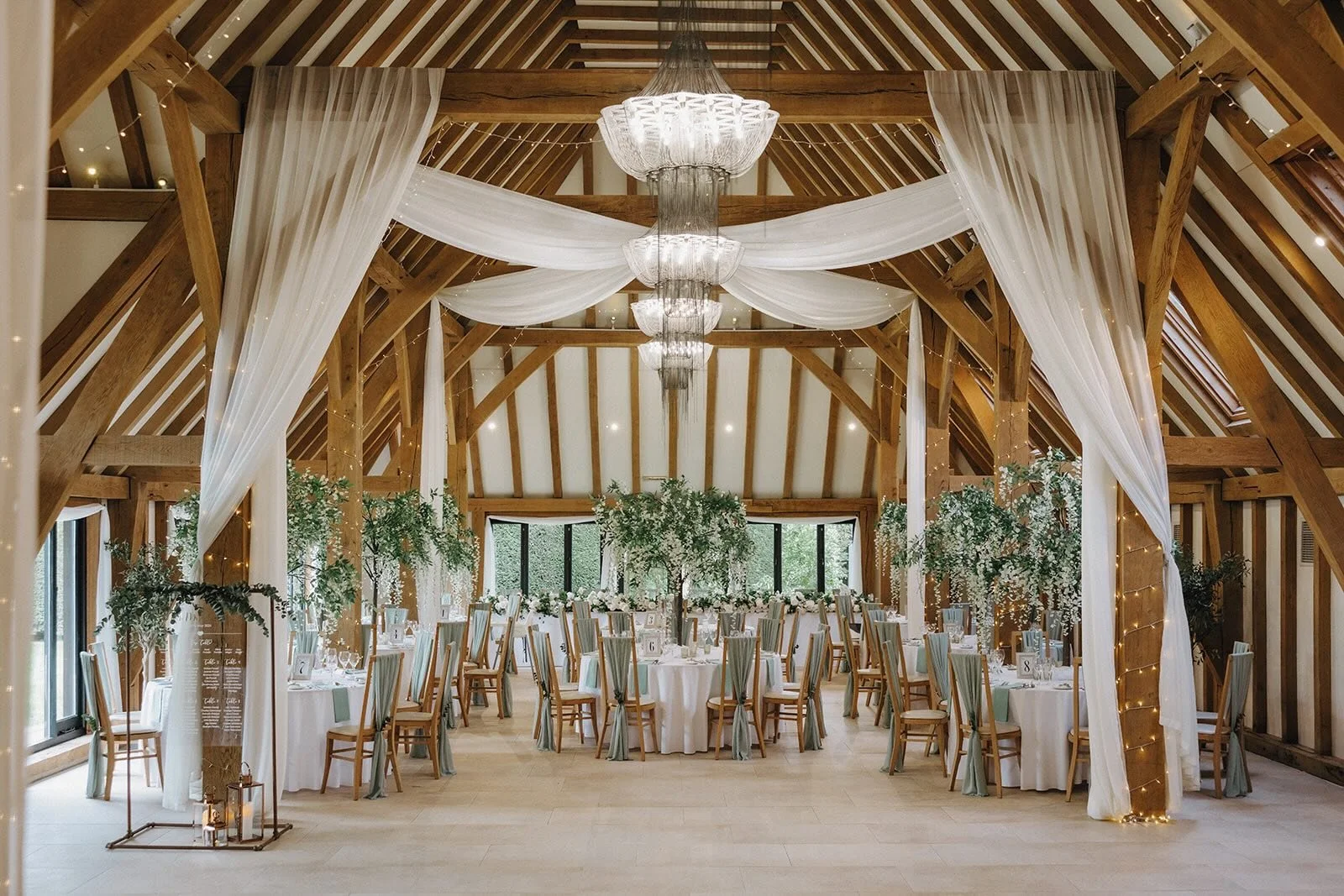 barn interior with drapes and green decor