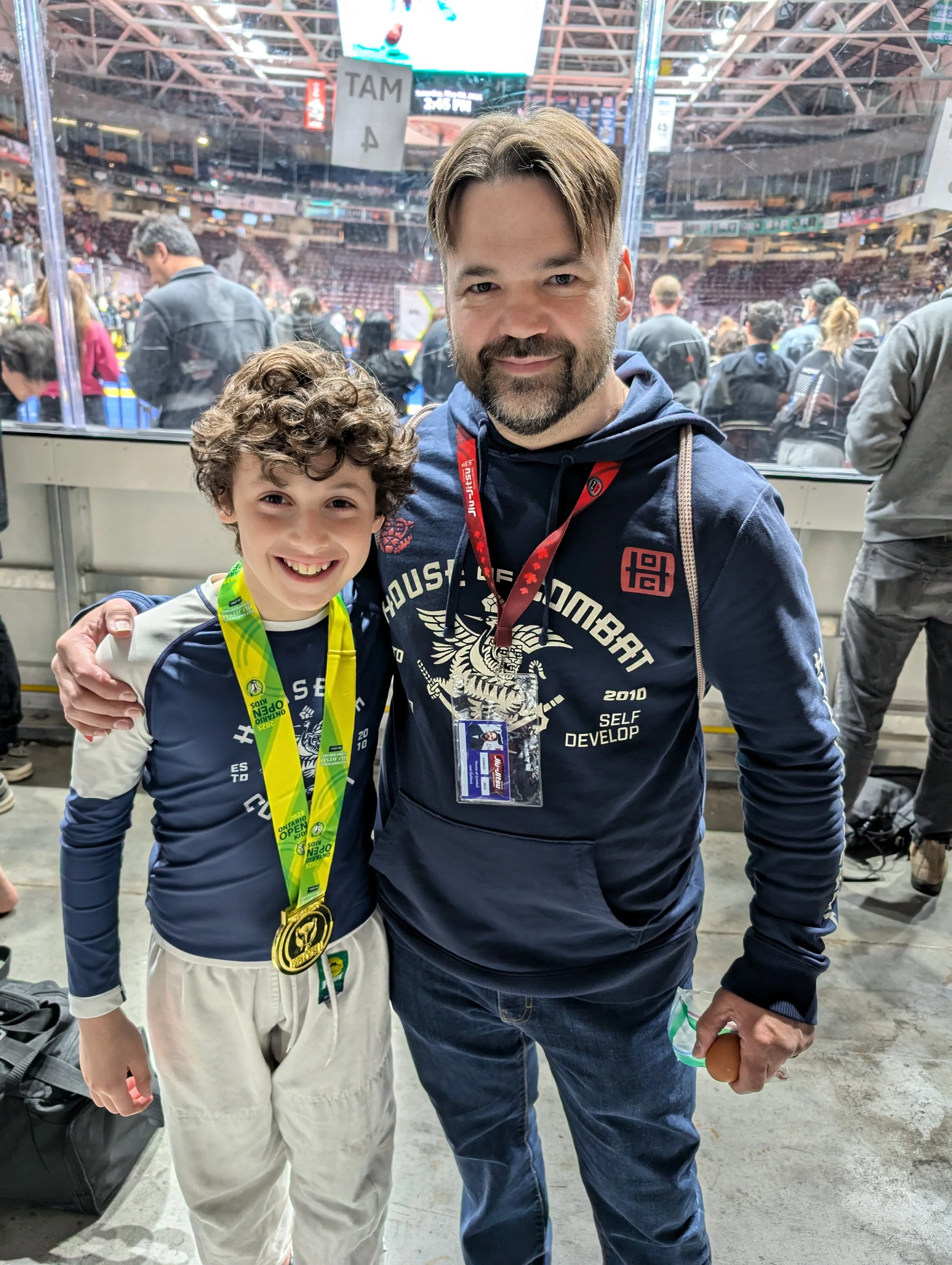 Coach Joel with O. who won gold at Ontario Open 2025