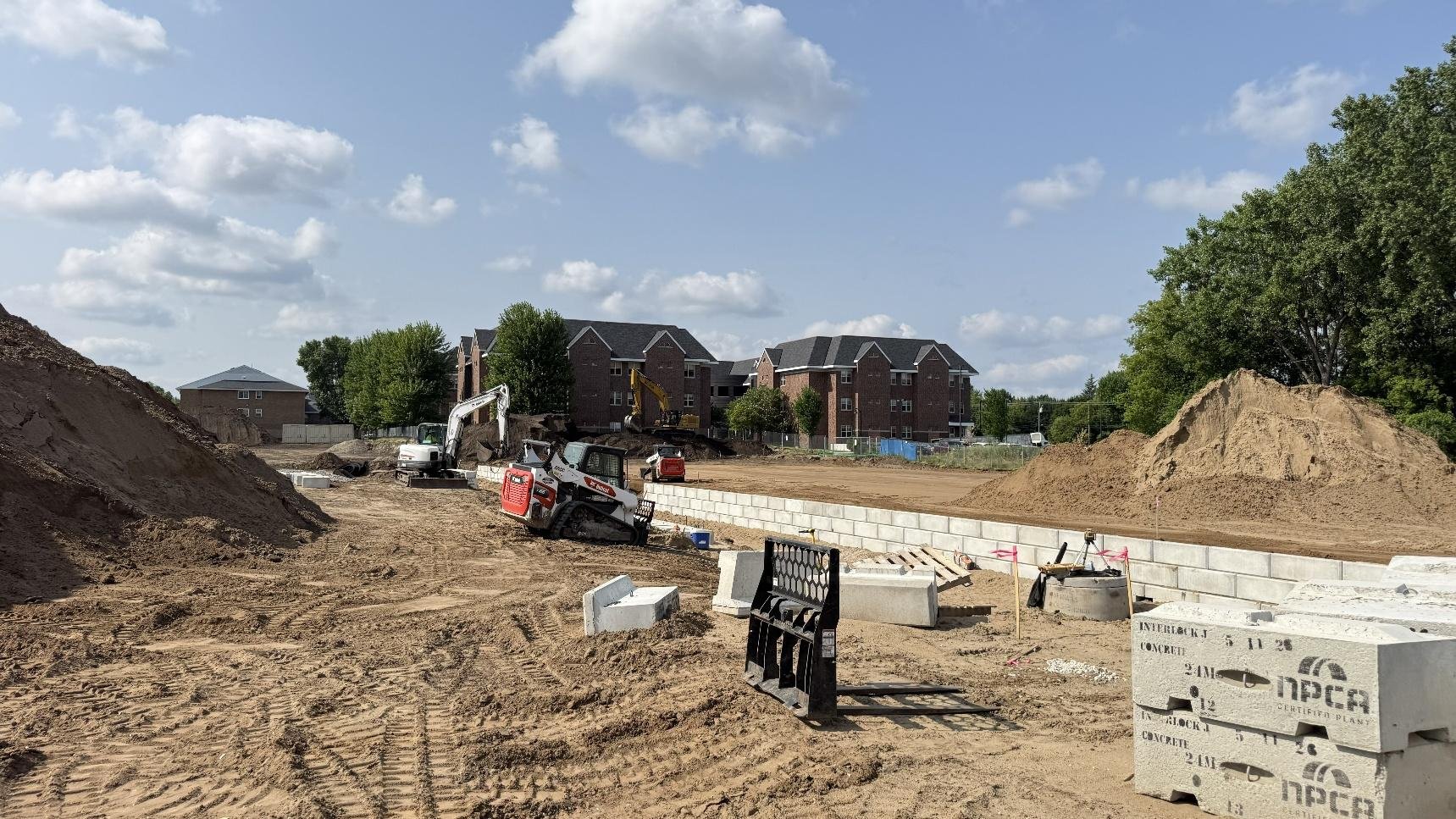 July 28, 2026: South parking lot retaining wall