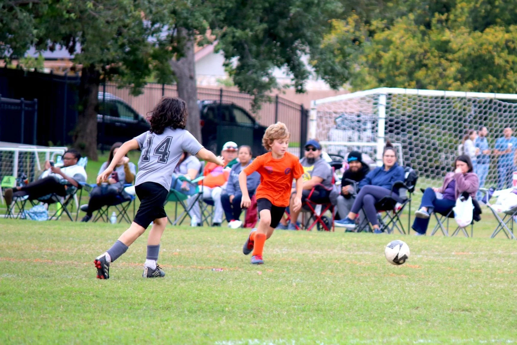 youth soccer, grey & orange jerseys