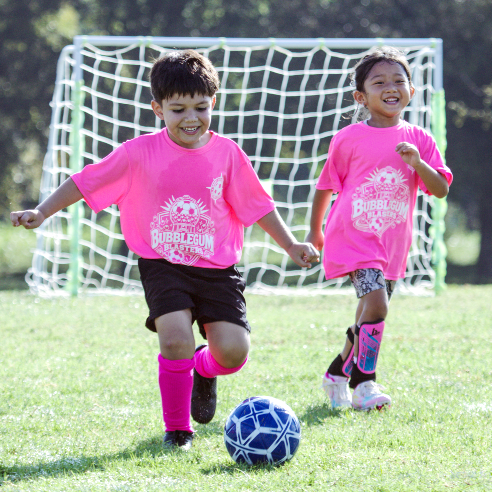 youth soccer, pink jerseys. Photo by Koryna Castro