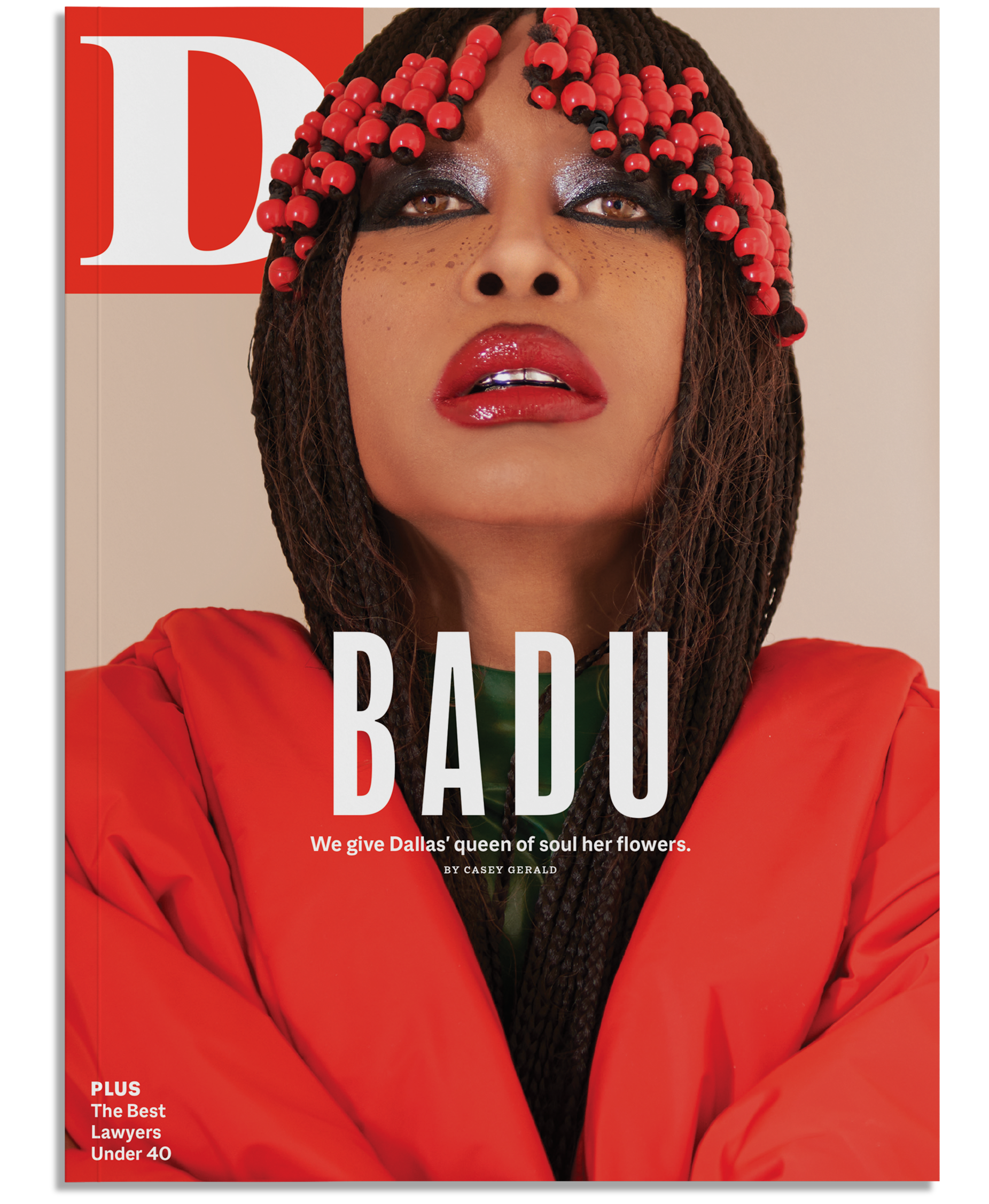 Close-up of a woman with braided hair and bold makeup, wearing a red jacket with a beige background. Magazine cover with large white text "BADU" and smaller text regarding Dallas' queen of soulful flowers and lawyers under 40.