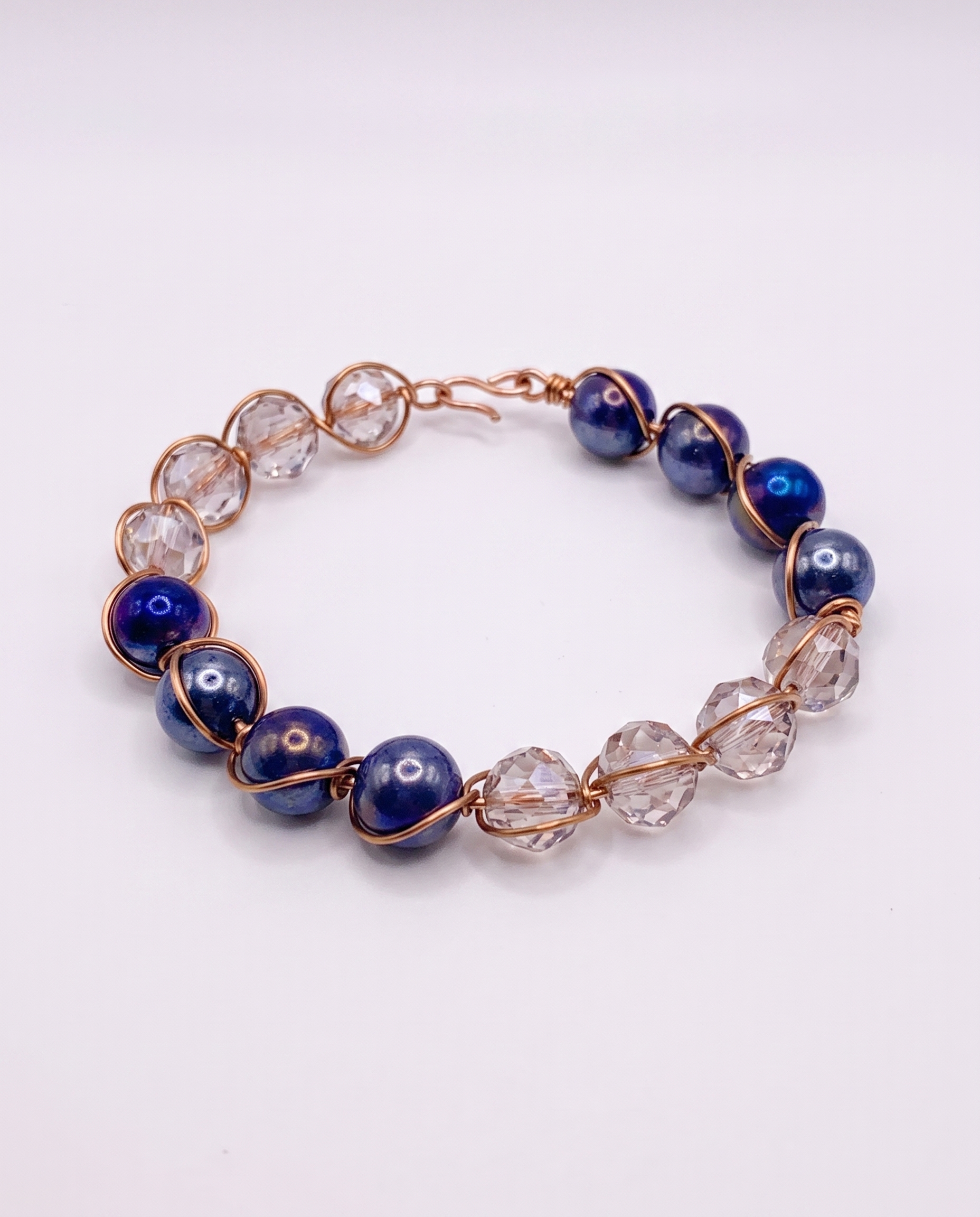 copper bracelet - clear and dark purple.png