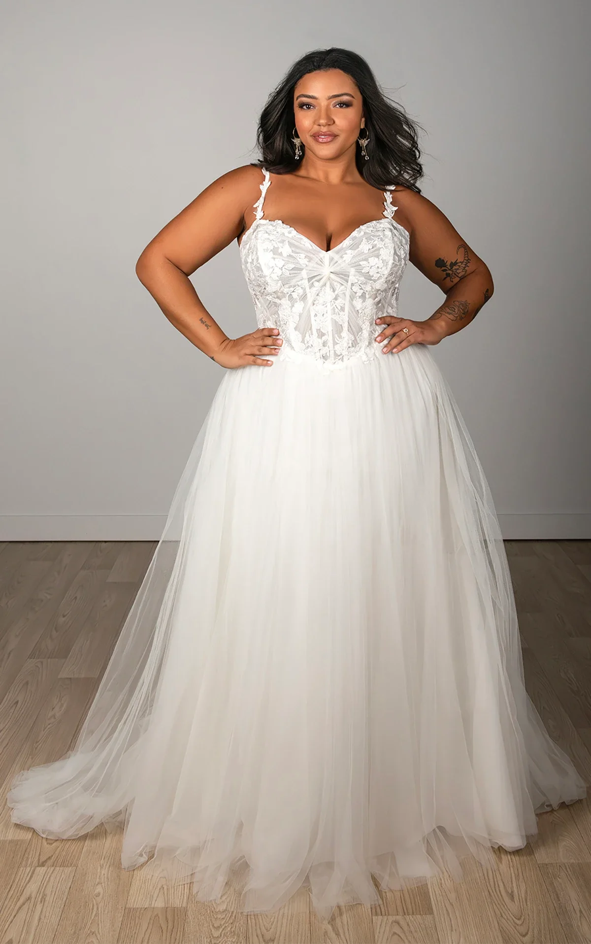 A-Line wedding dress with colourful embroidered lace and light pink tulle