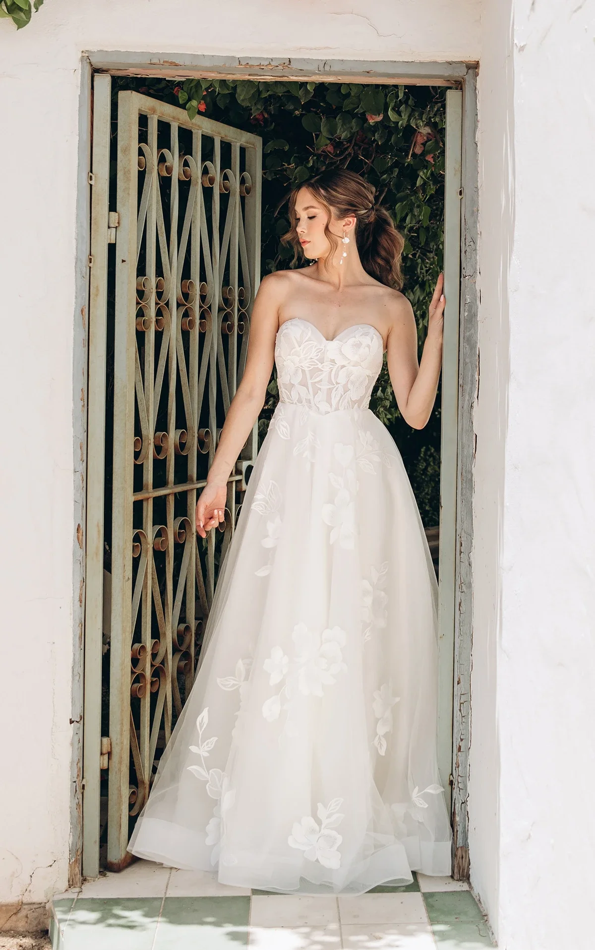 A-Line wedding dress with oversized floral lace appliqués