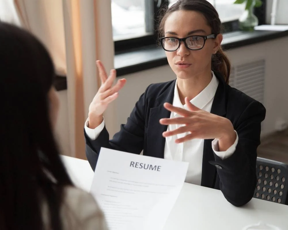 HR professional interviewing a candidate.