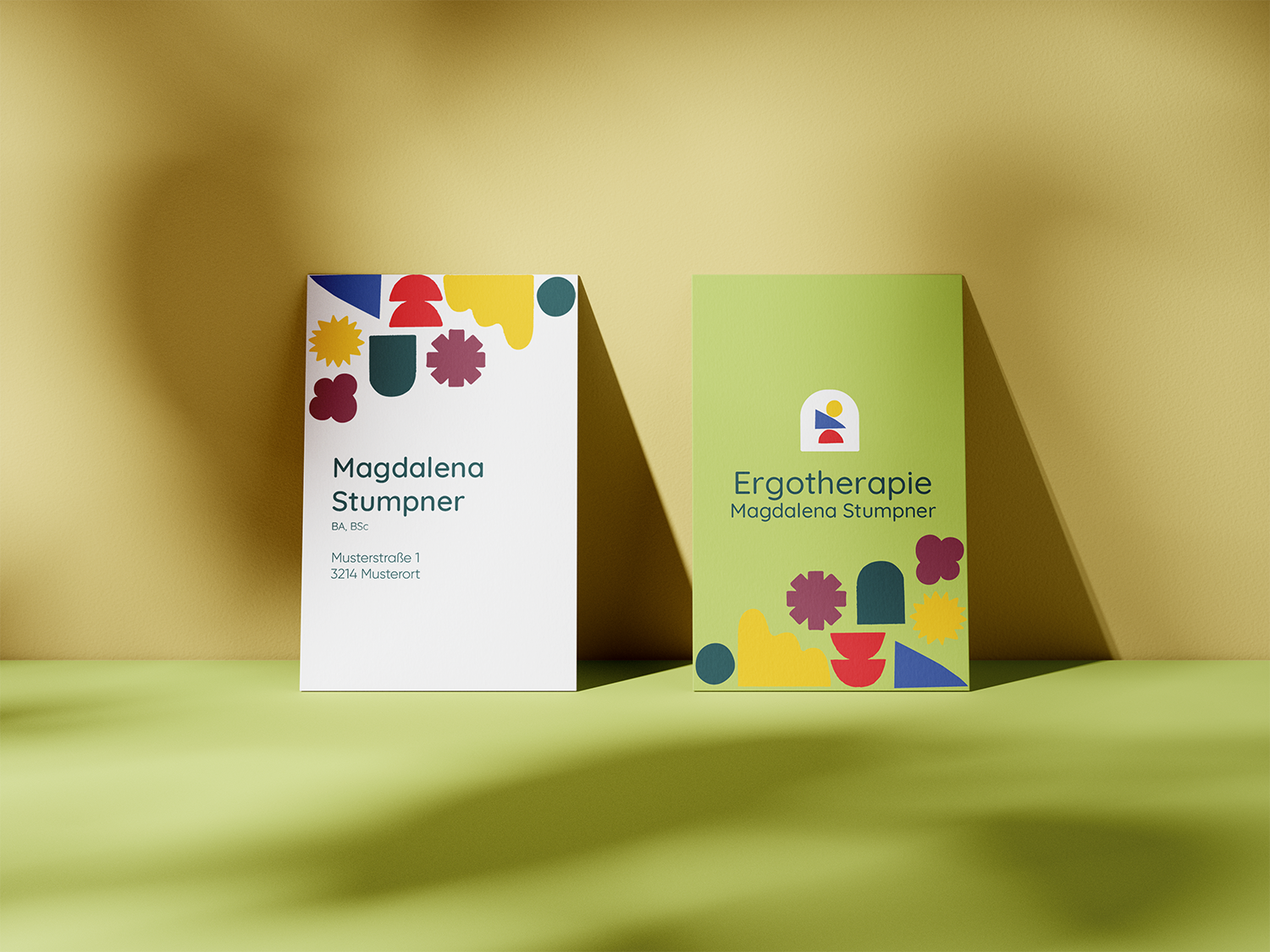 Visitenkarten mit Logo und Farbwelt für eine ergotherapeutische Praxis für Kinder in Oberösterreich.