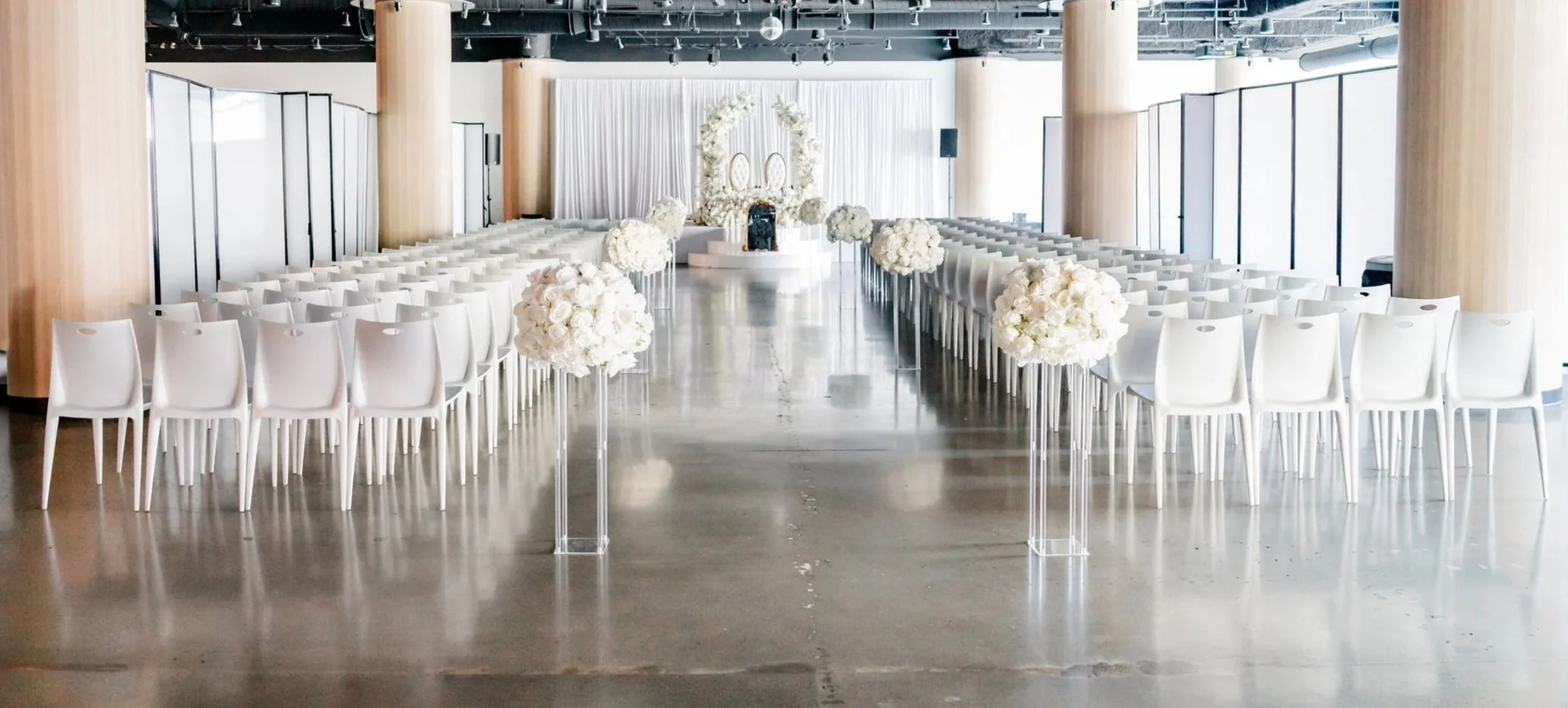 White+Wedding+Ceremony+Setup+Arch+Flowers.jpg