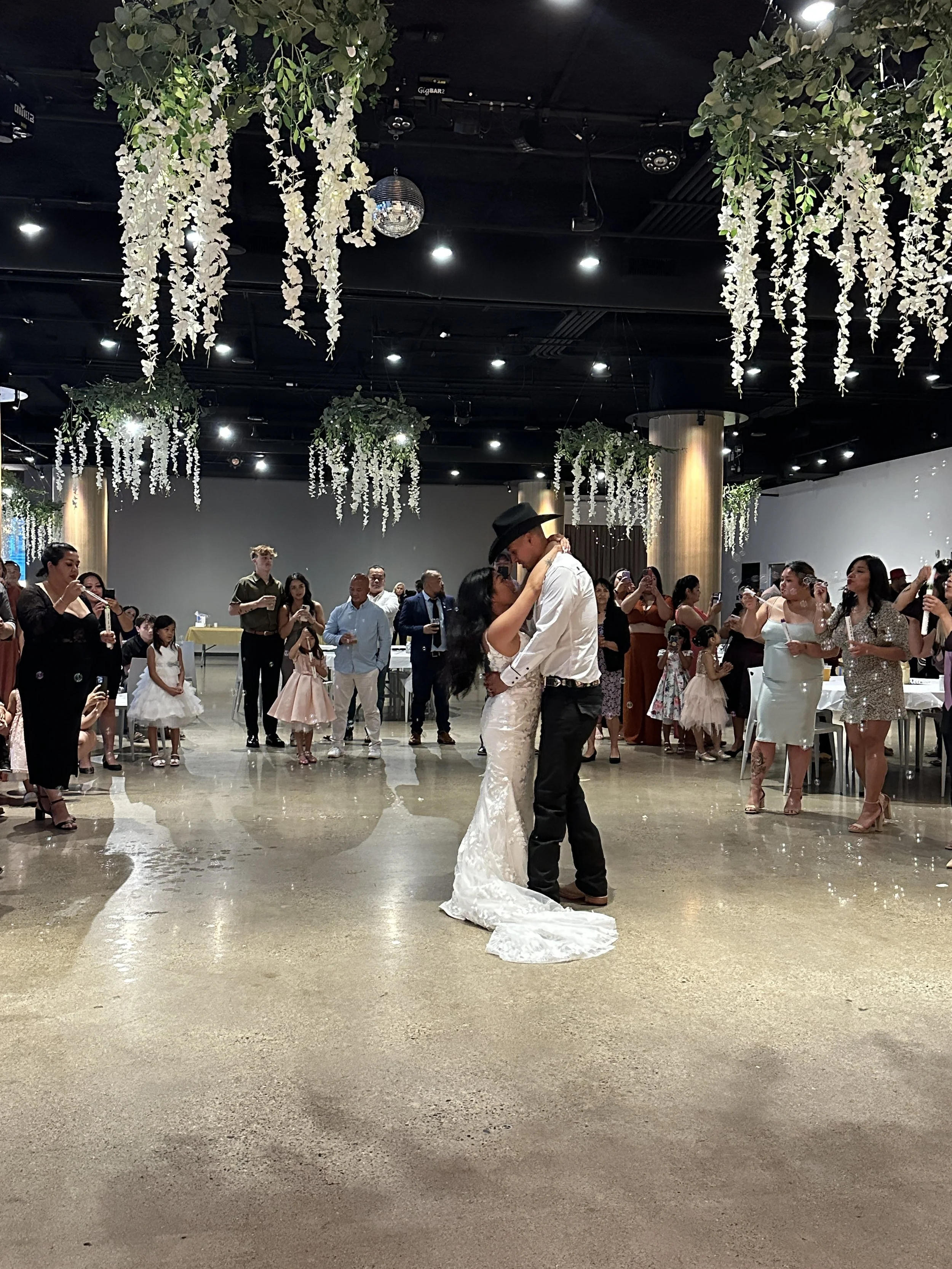 First Dance Bride Groom Hanging White Floral Ceiling.JPG