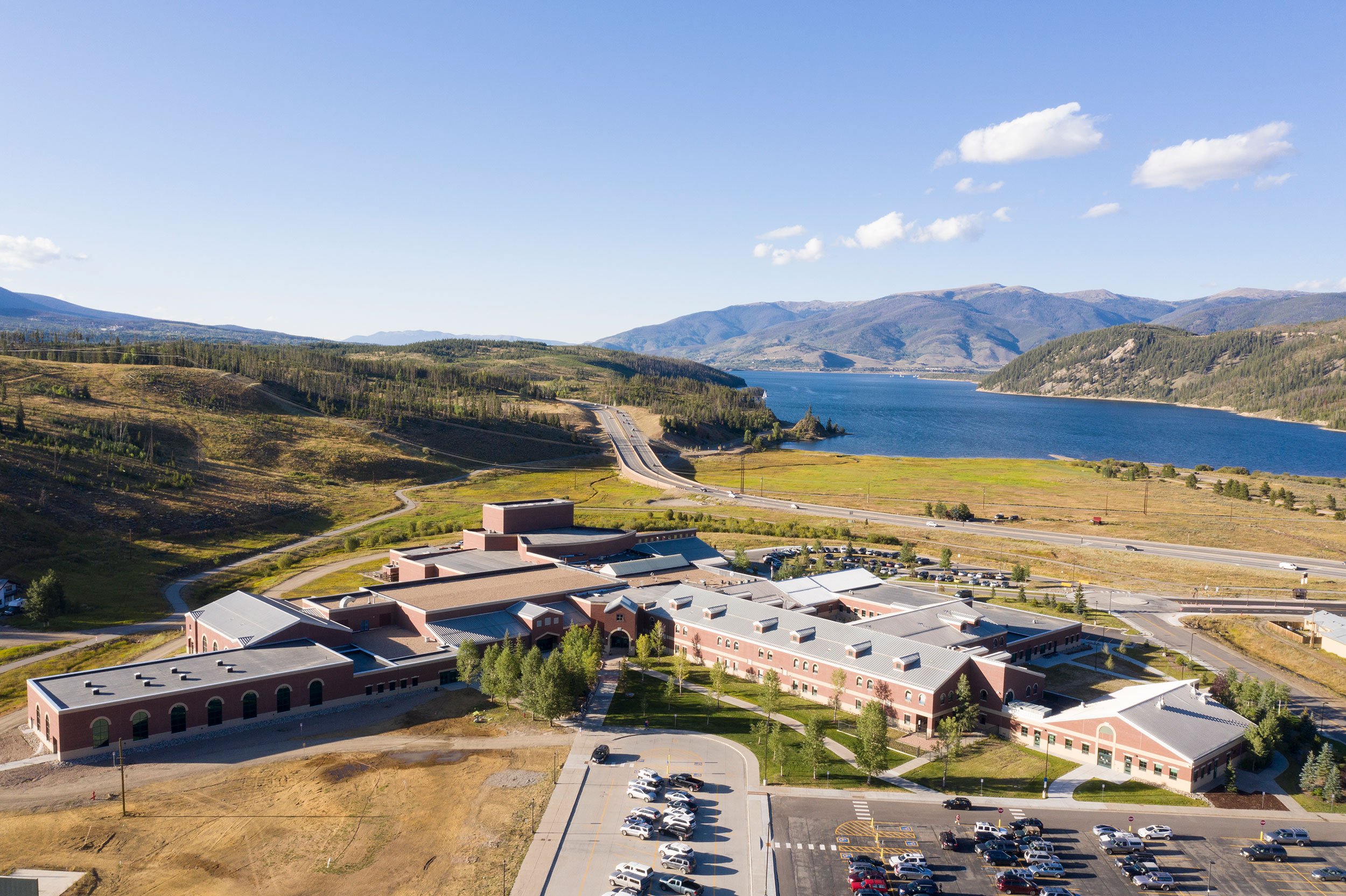 Exterior aerial drone image by licensed drone operator and architectural photographer Brad Nicol Photography of a school campus in Breckenridge, Colorado.