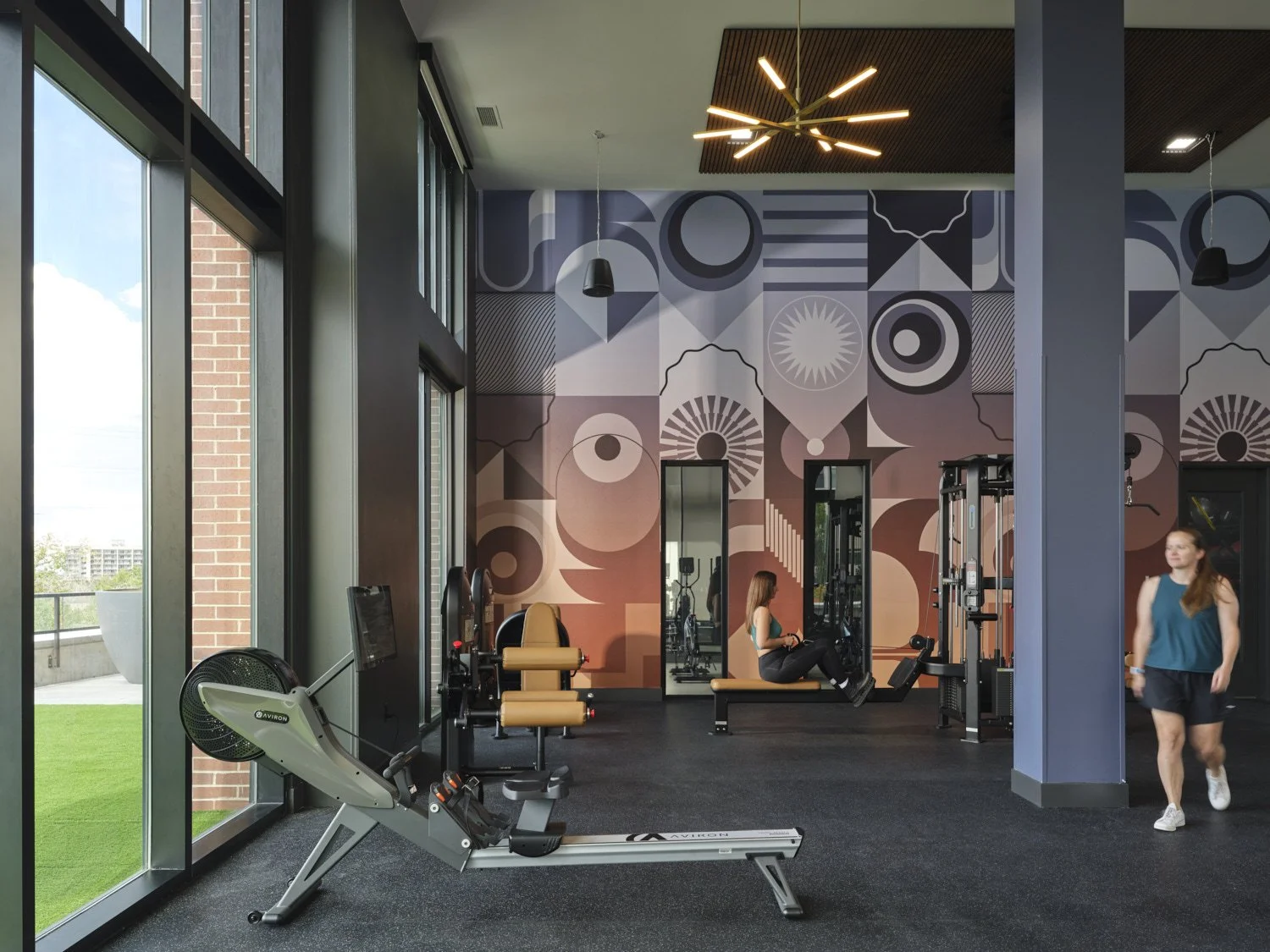 Interior architectural photograph by professional photographer Brad Nicol based in Denver, Colorado showing a multifamily property gym amenity interior in Denver.