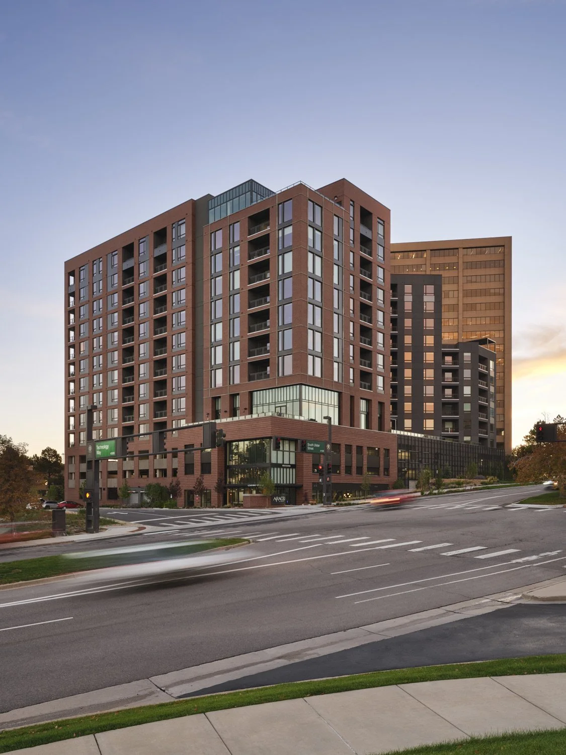 Exterior architectural photography by professional photographer Brad Nicol based in Denver, Colorado showing a multifamily property in Denver at dusk or dawn.