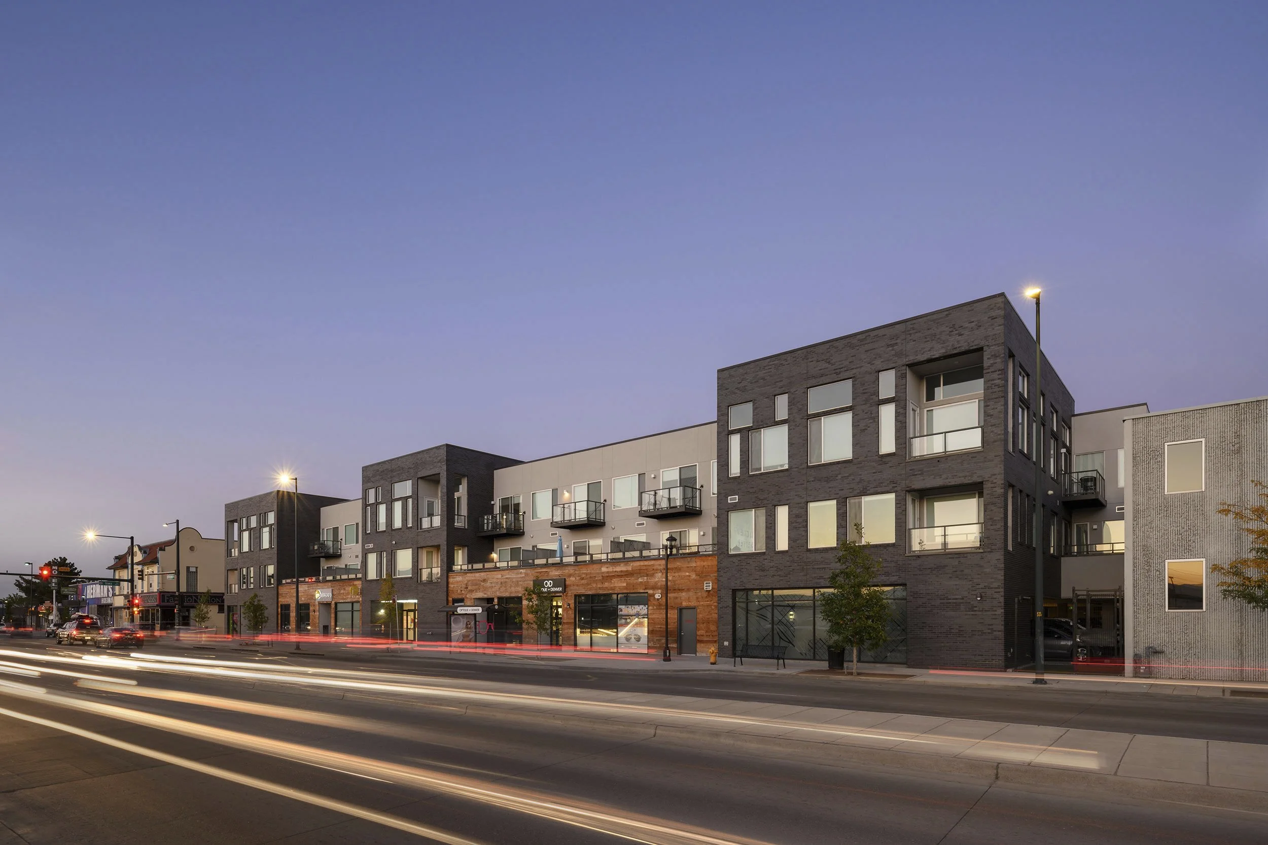 Exterior architectural photography by professional photographer Brad Nicol based in Denver, Colorado showing a multifamily property in Denver at dusk or dawn.