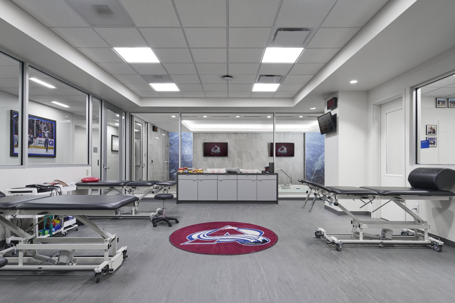 Interior image by architectural photographer Brad Nicol Photography of the Colorado NHL Avalanche professional hockey team in training and recovery sports medicine room.