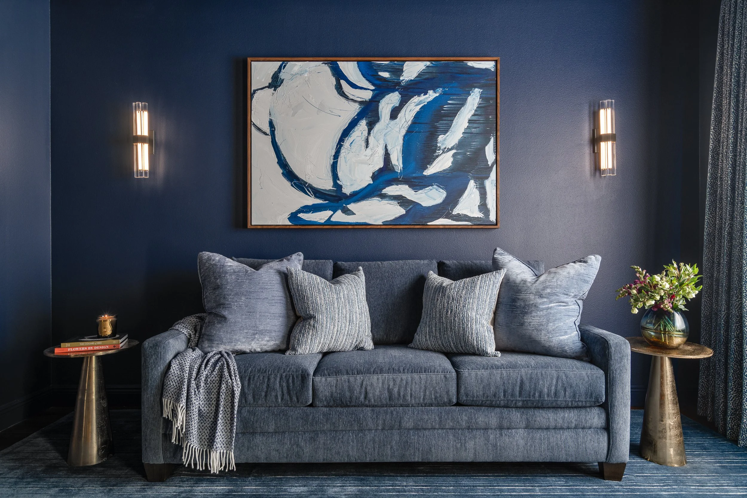 Bold interior design Tampa living room with moody walls and luxury finishes.