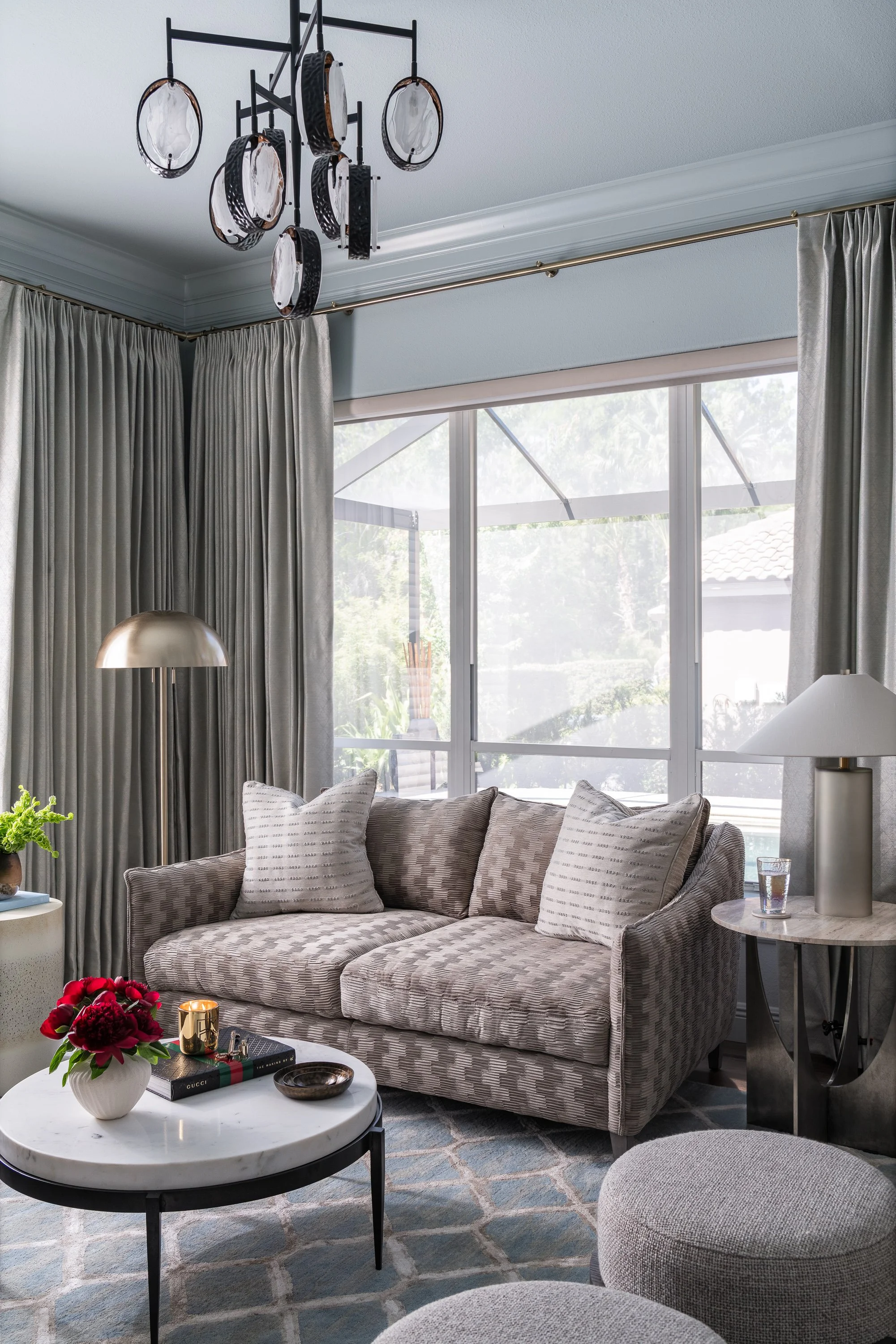 contemporary modern sunroom design A black and white abstract illustration of a stylized human figure in profile, with swirling lines and geometric shapes forming the body and background.