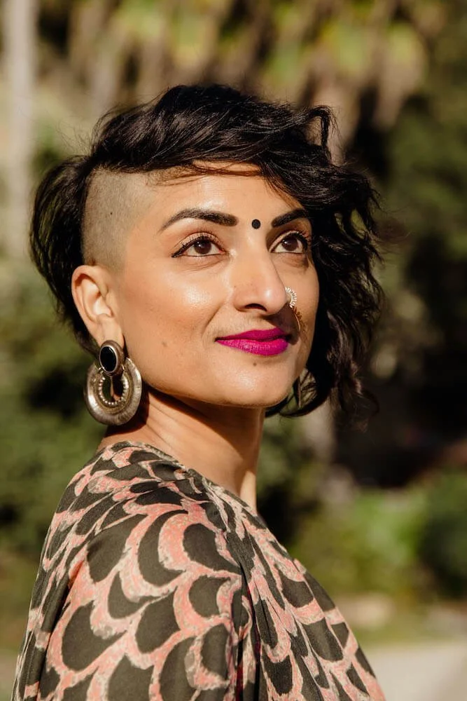 Ep-108_Meenadchi_Headshot (1).jpeg