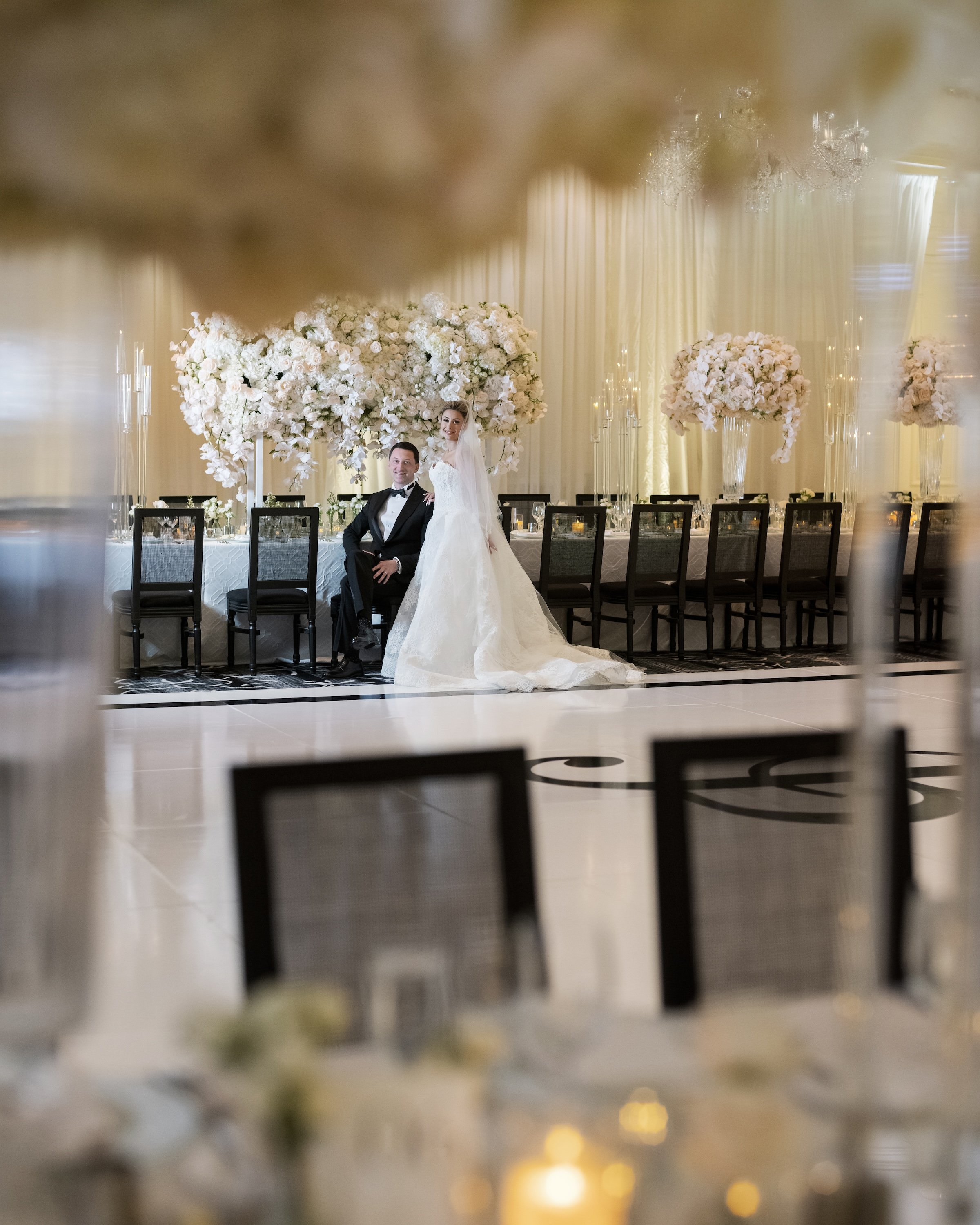 Reception floral design at a Persian wedding at the Ritz-Carlton San Francisco planned by Burke Events