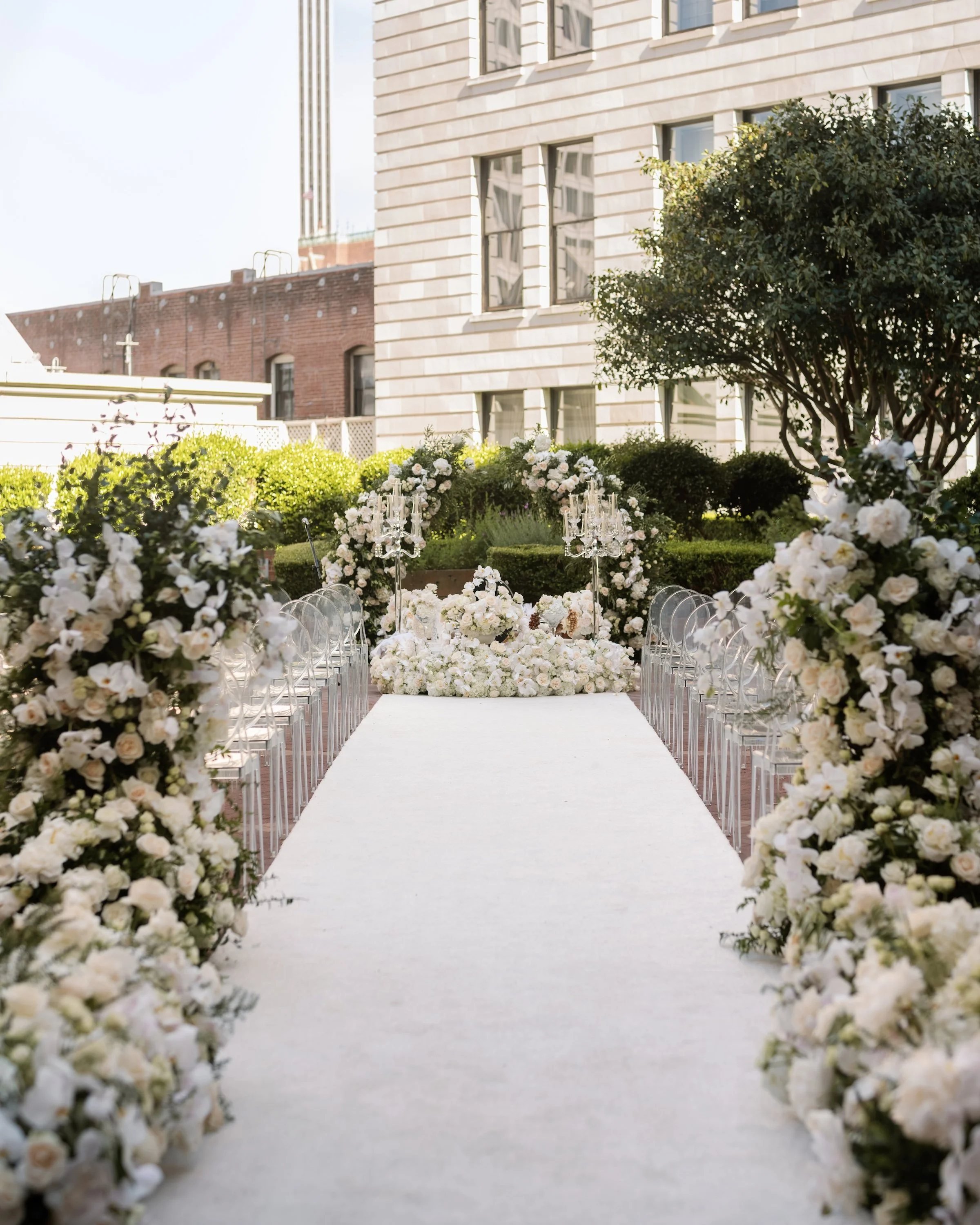 Ceremony floral design at a Persian wedding at the Ritz-Carlton San Francisco planned by Burke Events