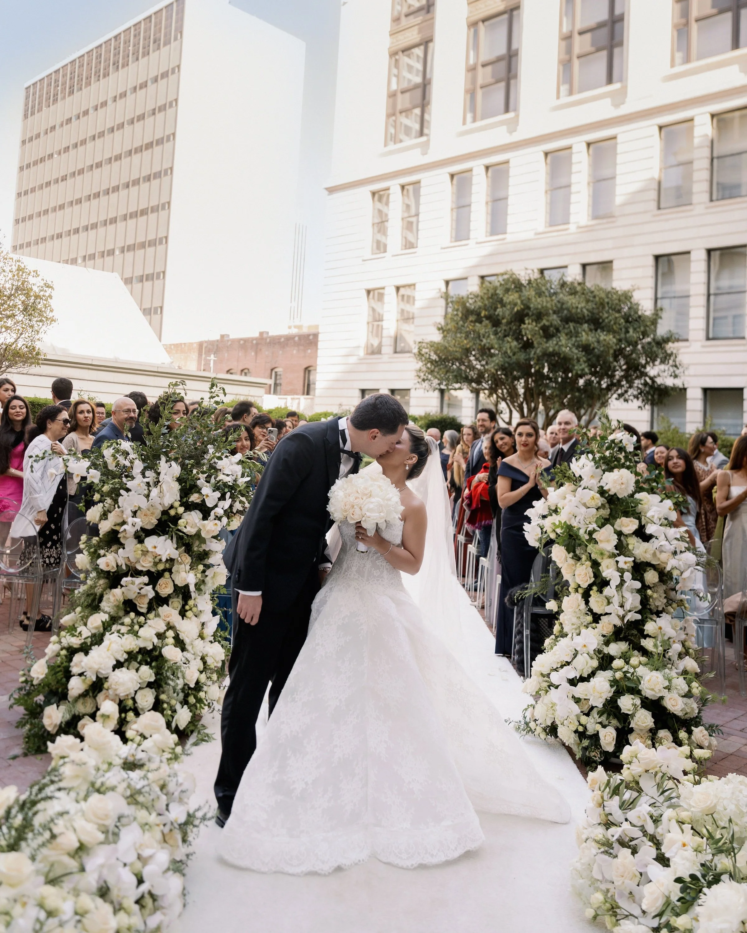 Ceremony floral design at a Persian wedding at the Ritz-Carlton San Francisco planned by Burke Events