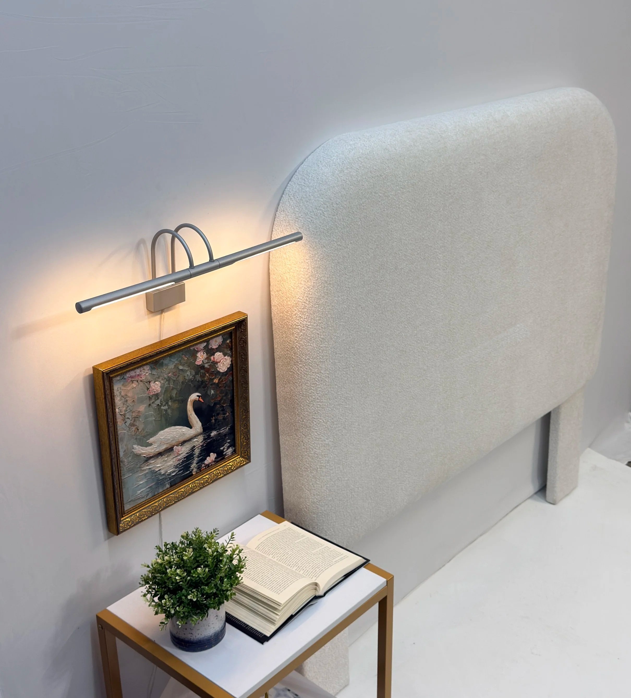 bouclé headboard This piece features a modern arched or curved silhouette wrapped in a luxurious, cozy bouclé texture. Bouclé is incredibly trendy right now for modern organic, minimalist, and upscale transitional designs.