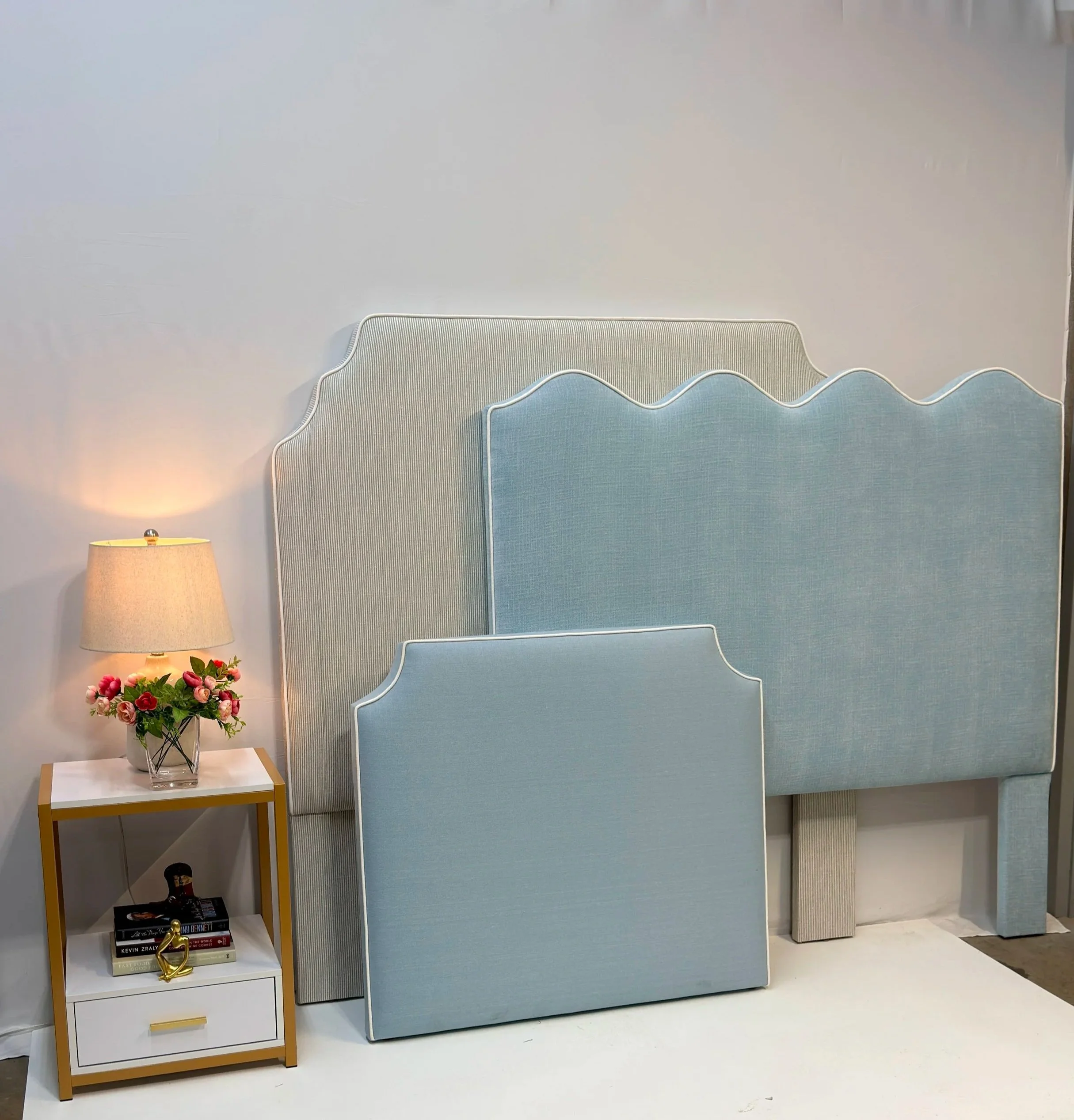 A bedroom with a twin size light blue panels headboard for dorm bedroom or college students