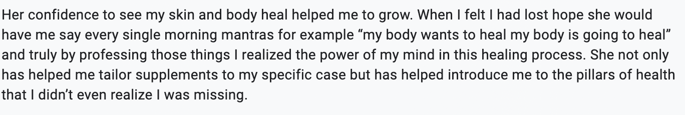 A woman writing and reflecting on personal growth and healing, emphasizing the importance of mental health and positive thinking.