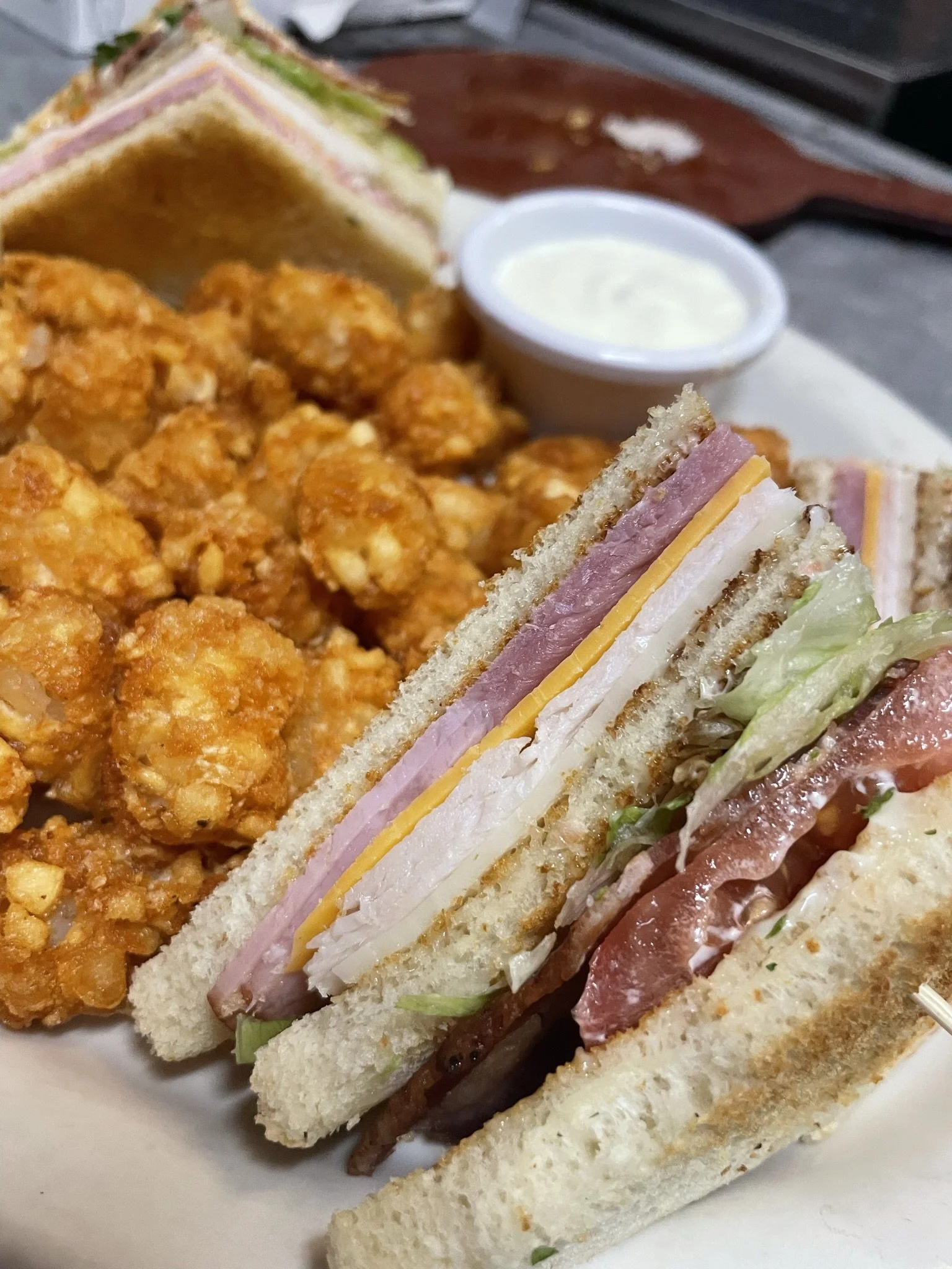 Cloverleaf Sports Bar & Grill Sandwhich and Tots.jpeg