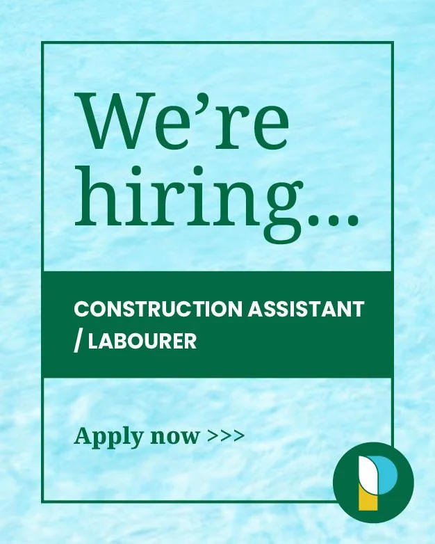 Man wearing a black cap, a blue work shirt with a yellow and white logo that reads 'Premier Pools, The Pool Professionals,' and a name tag that says 'David Ybarra'.