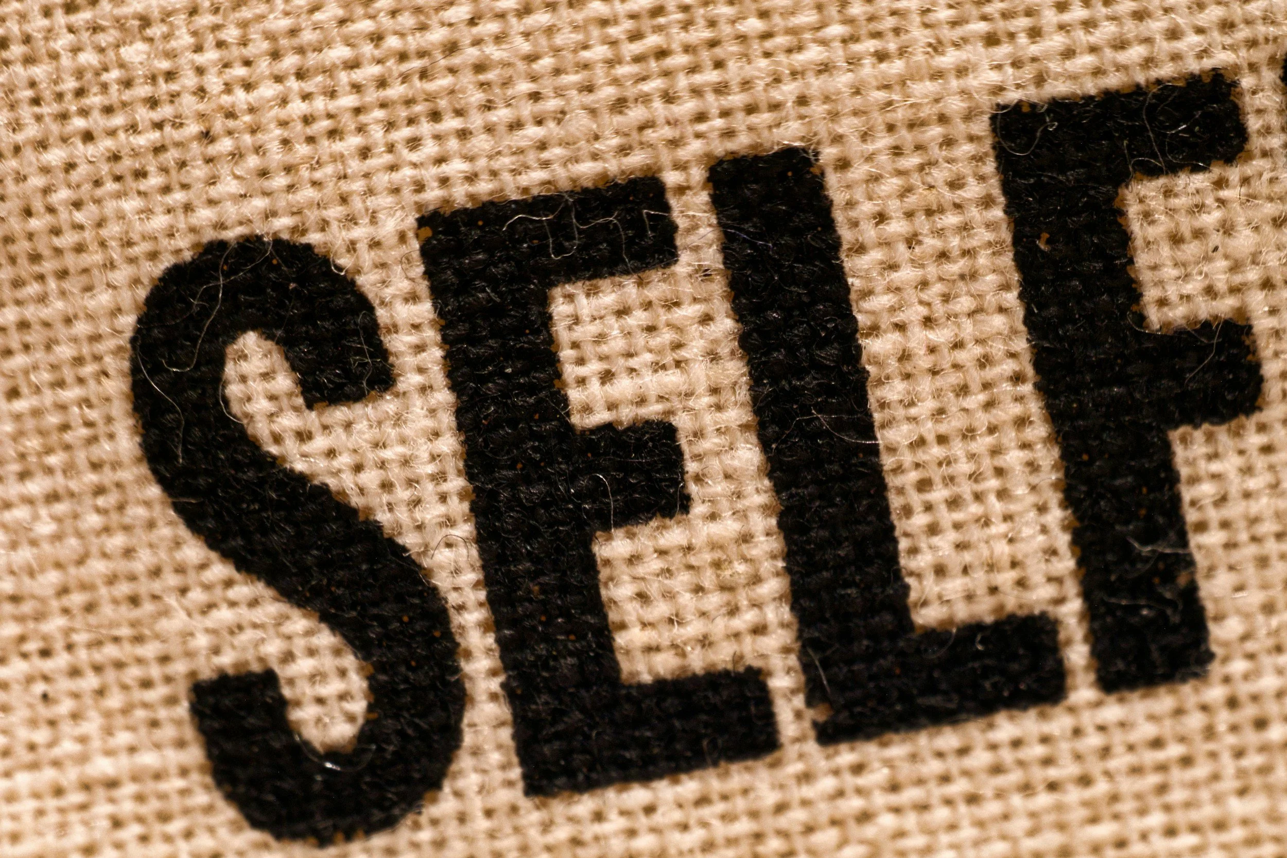 SELF letters in cloth