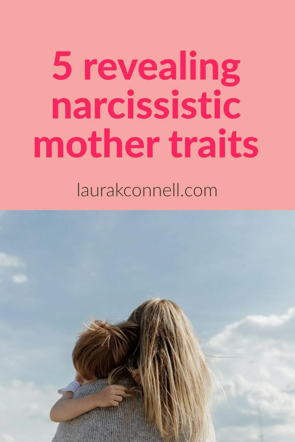 blond mother holding blond child with backs turned