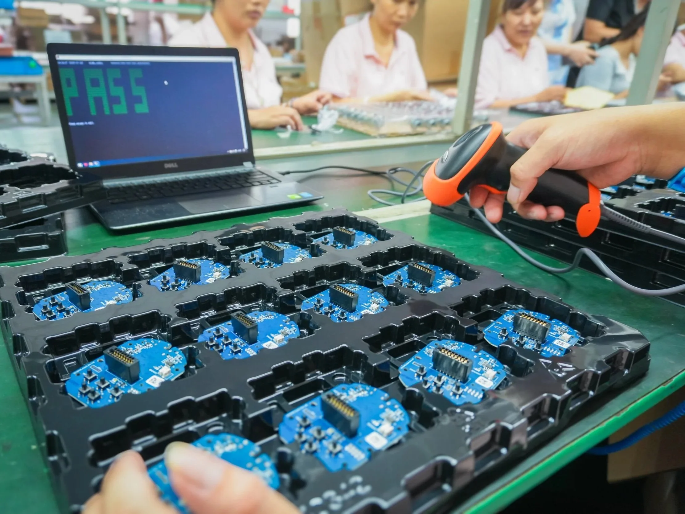 Electronics assembly line with modular manufacturing components and quality testing