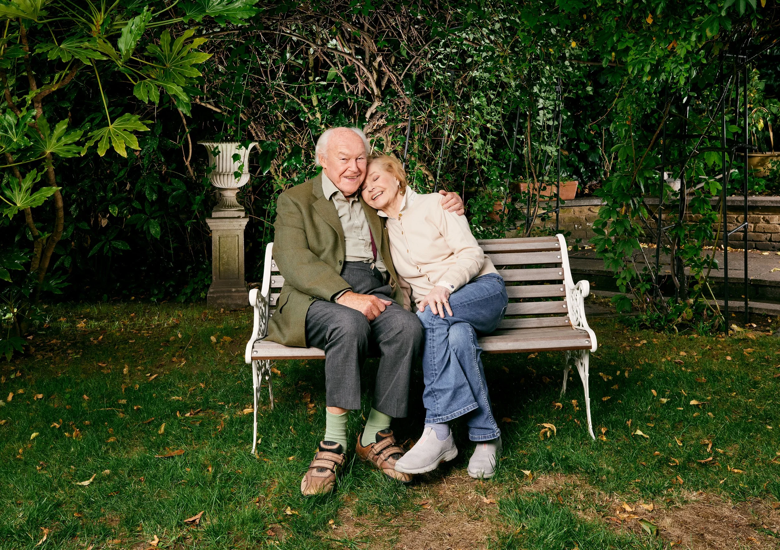 Timothy West with Prunella Scales in their garden.