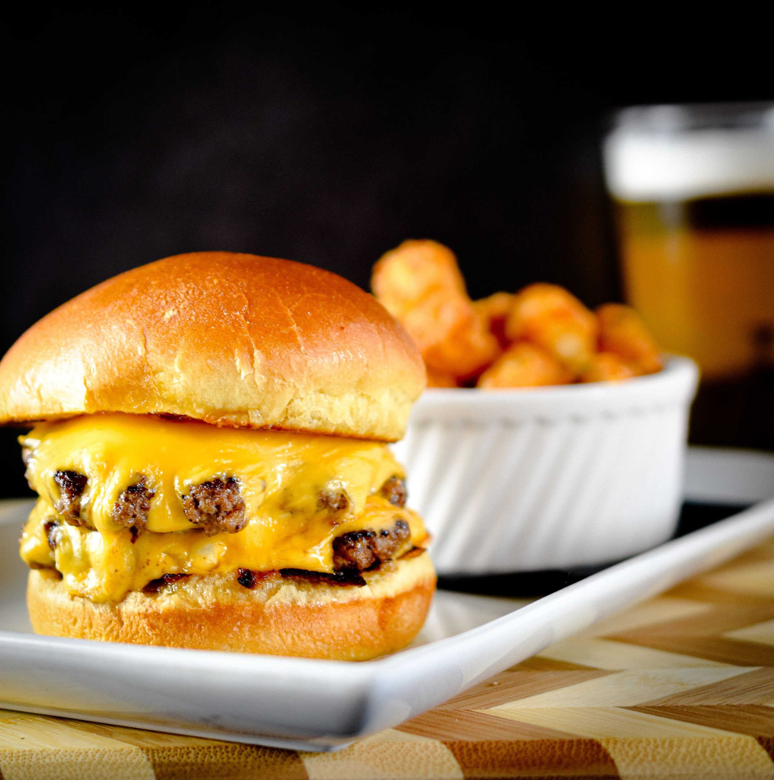 Classic BnB Basic Burger with lettuce, tomato, and cheese at Battle & Brew.