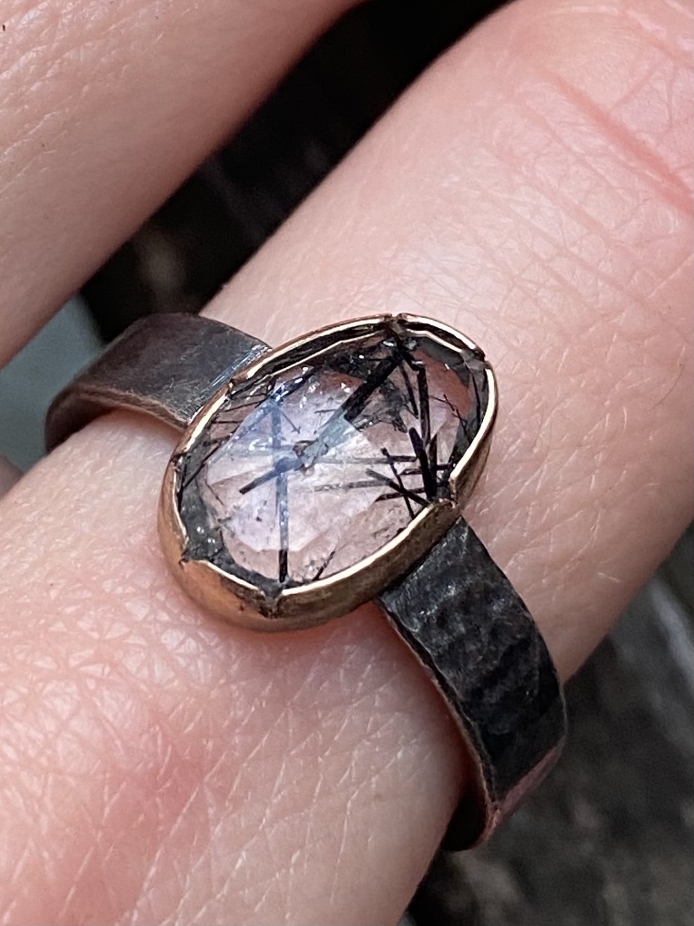 Oval Tourmalinated Quartz on an Round Textured Band on.jpg
